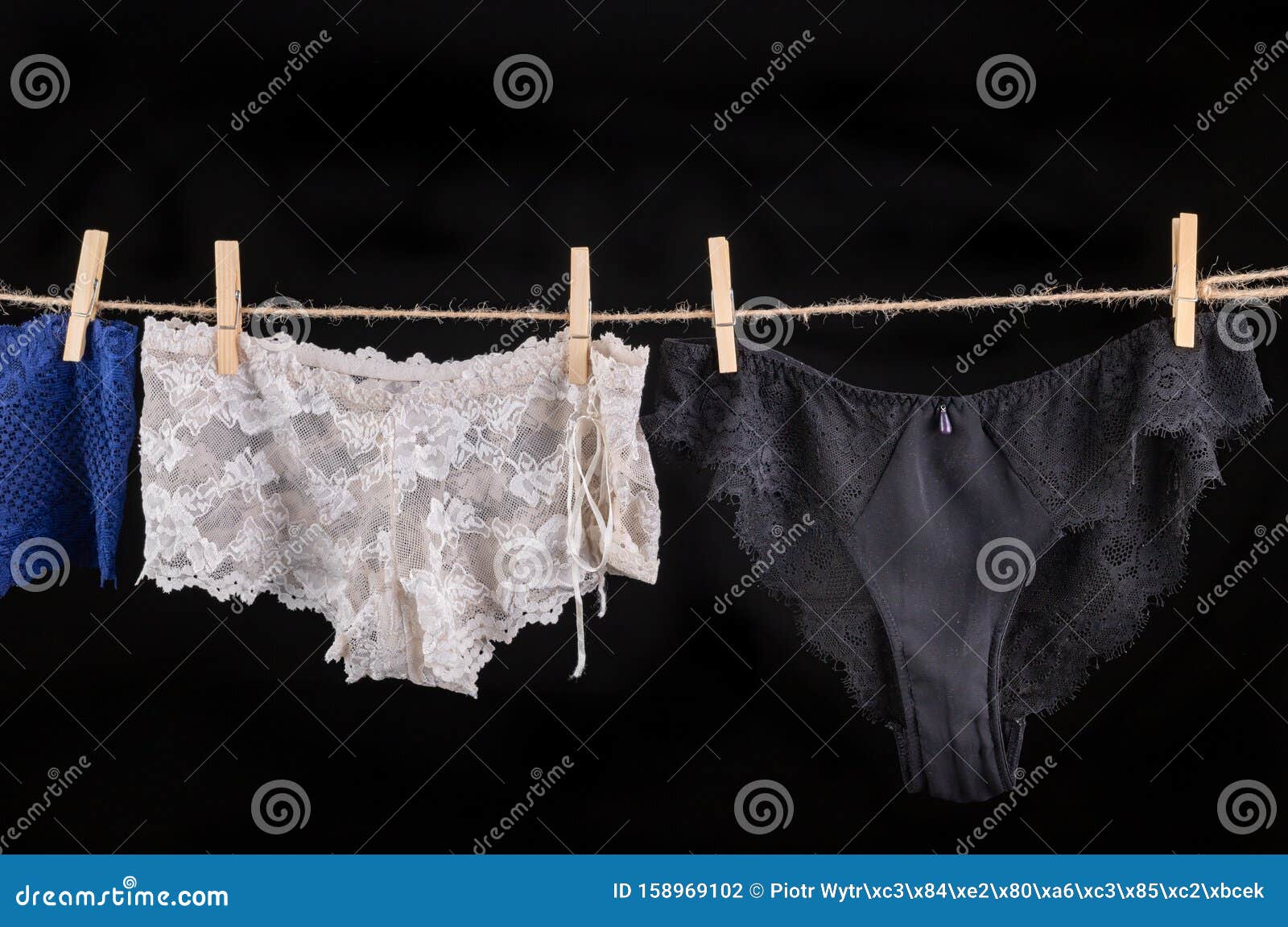 Linen Drying on a String. Women`s Panties Pinned To a String Stock Photo -  Image of isolated, lingerie: 158969102