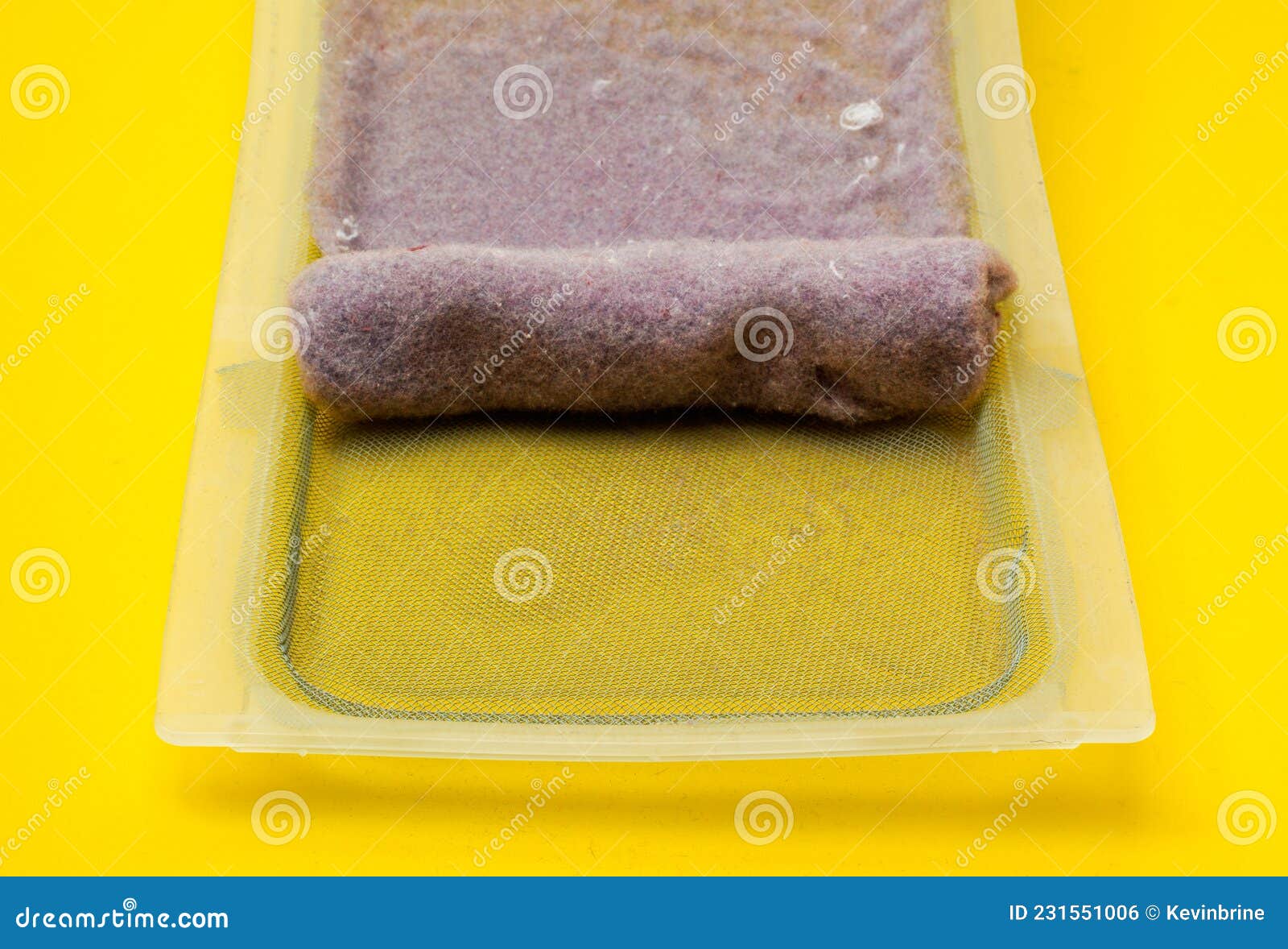 Lint Trap on Yellow stock photo. Image of textile, screen 231551006
