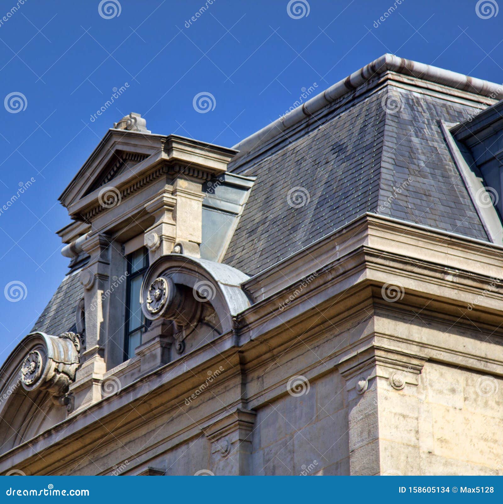 a dormer window of classical hellenic architectural form
