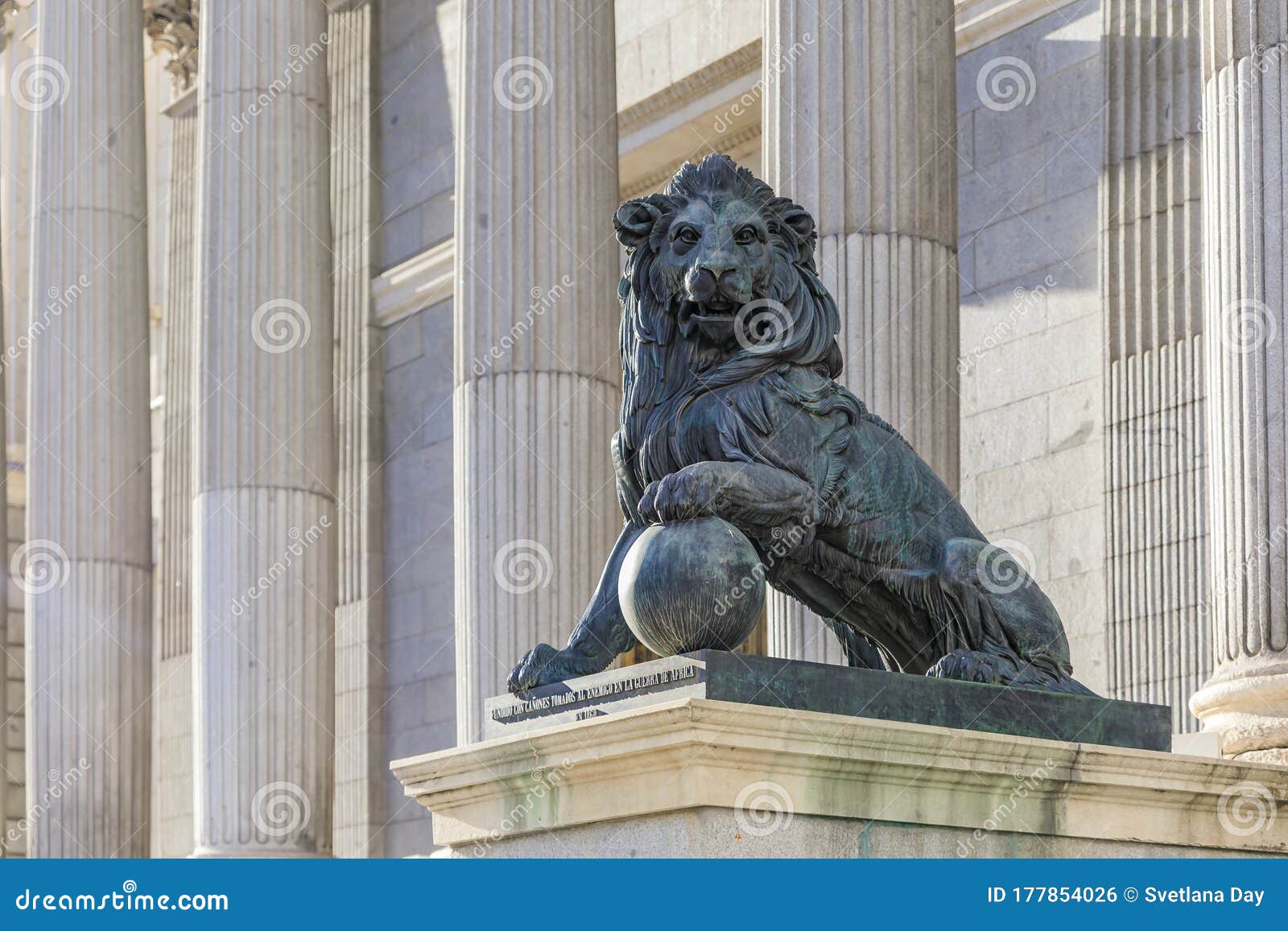 lion sculpture by the congress of deputies - congreso de los diputados spanish parliament, palacio de las cortes, madrid
