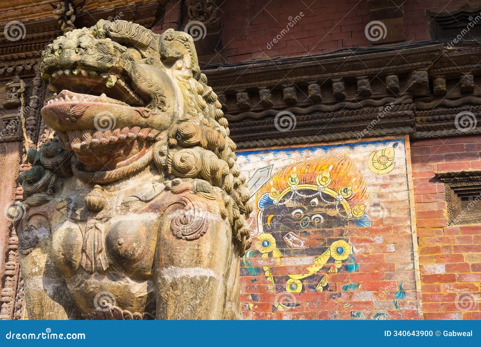 lion statue warding a gate, mul chowk courtyard, hanuman dhoka royal palace, patan durbar square, lalitpur, nepal, asia