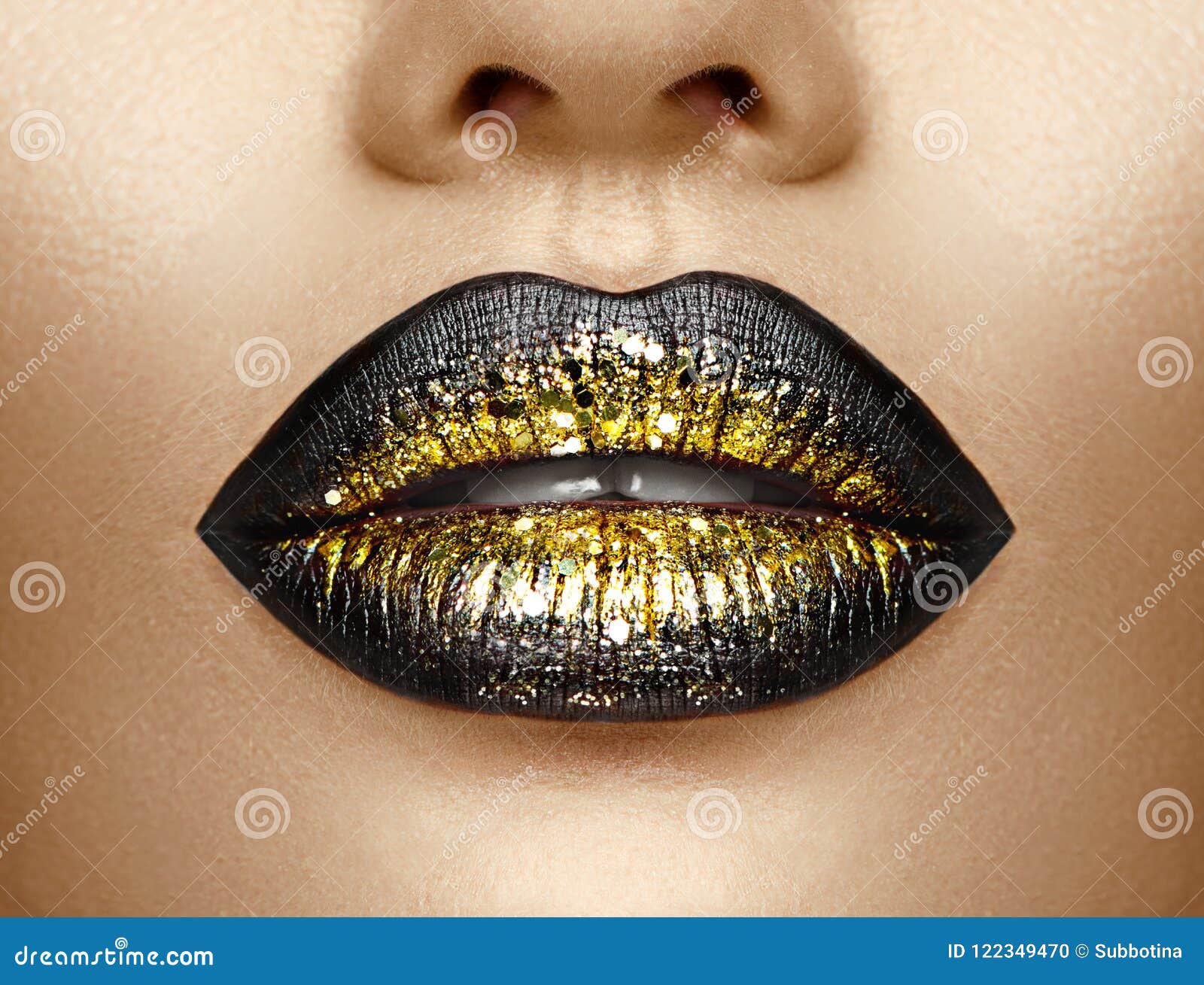 lips makeup. beauty high fashion gradient lips makeup sample, black with golden color. mouth. lipstick