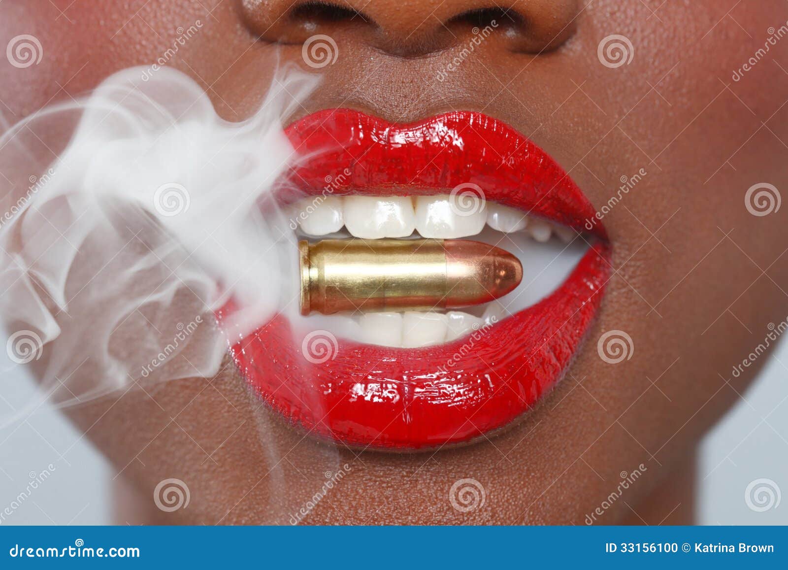 Lips Of A Woman With A Bullet And Smoke Stock Photo - Image: 33156100
