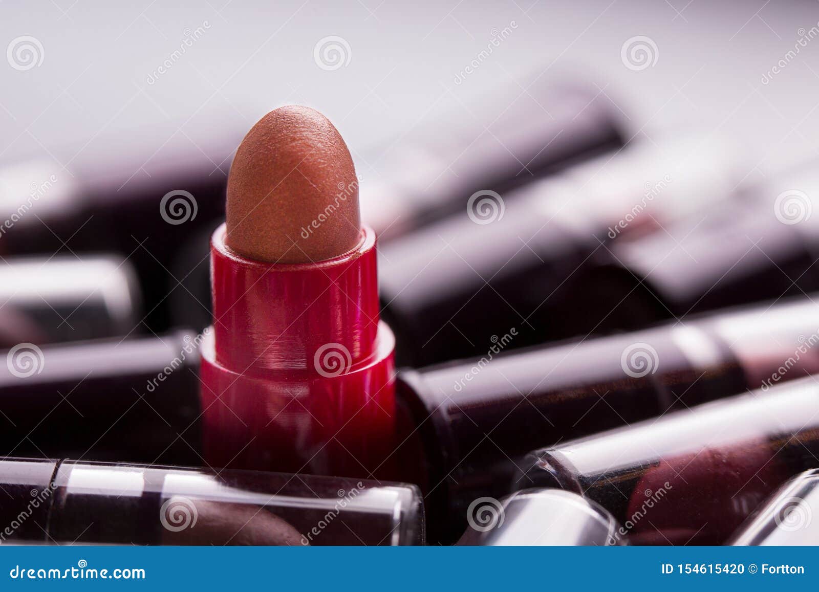 Lipstick Closeup. Many Tubes of Lipstick. Stock Photo Image of makeup