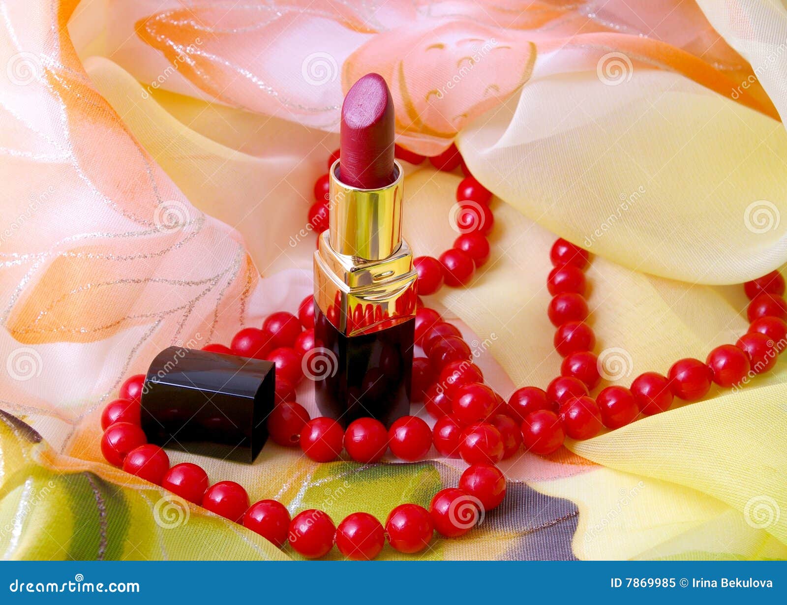 Lipstick and necklace. stock image. Image of horizontal 7869985