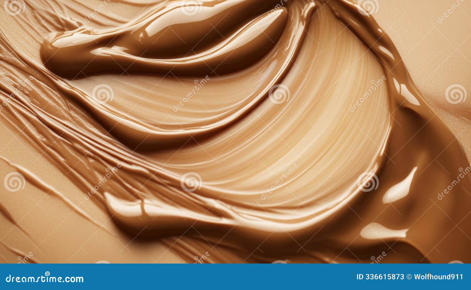 a liquid foundation cream in a medium caramel tone, featuring a smooth, creamy texture. the surface