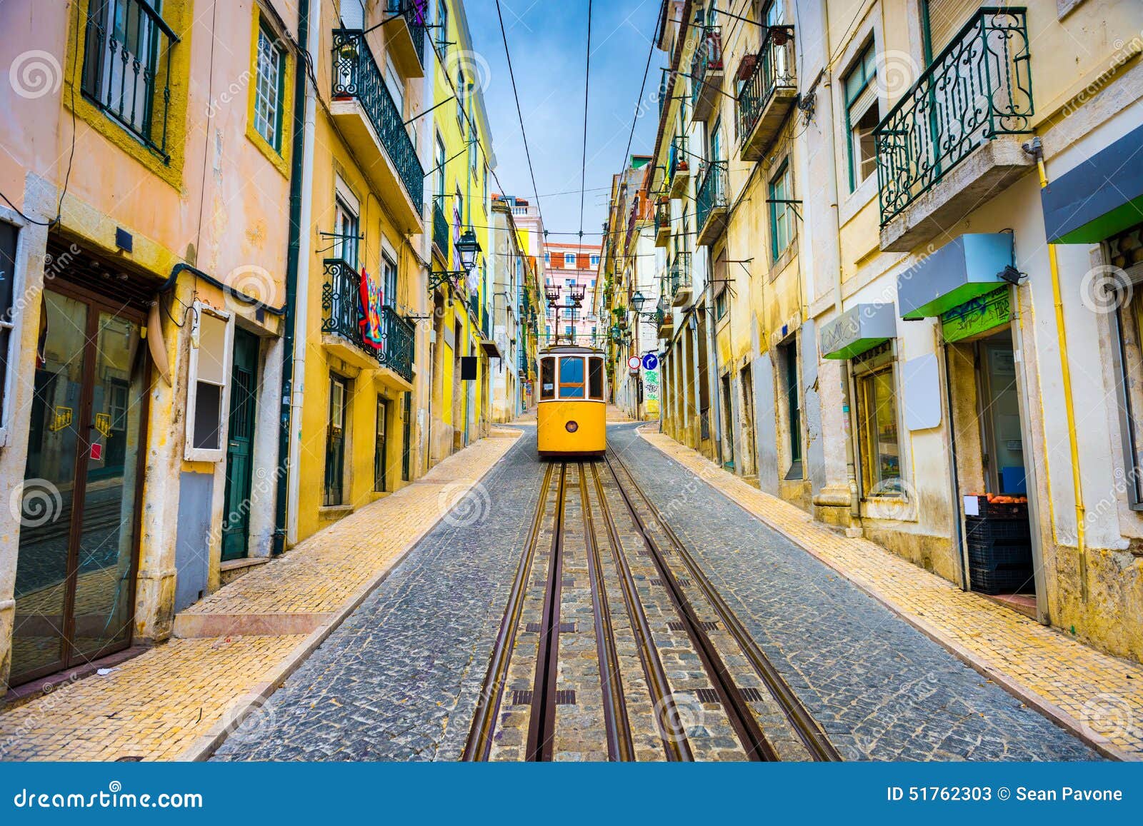 lisbon alley and tram