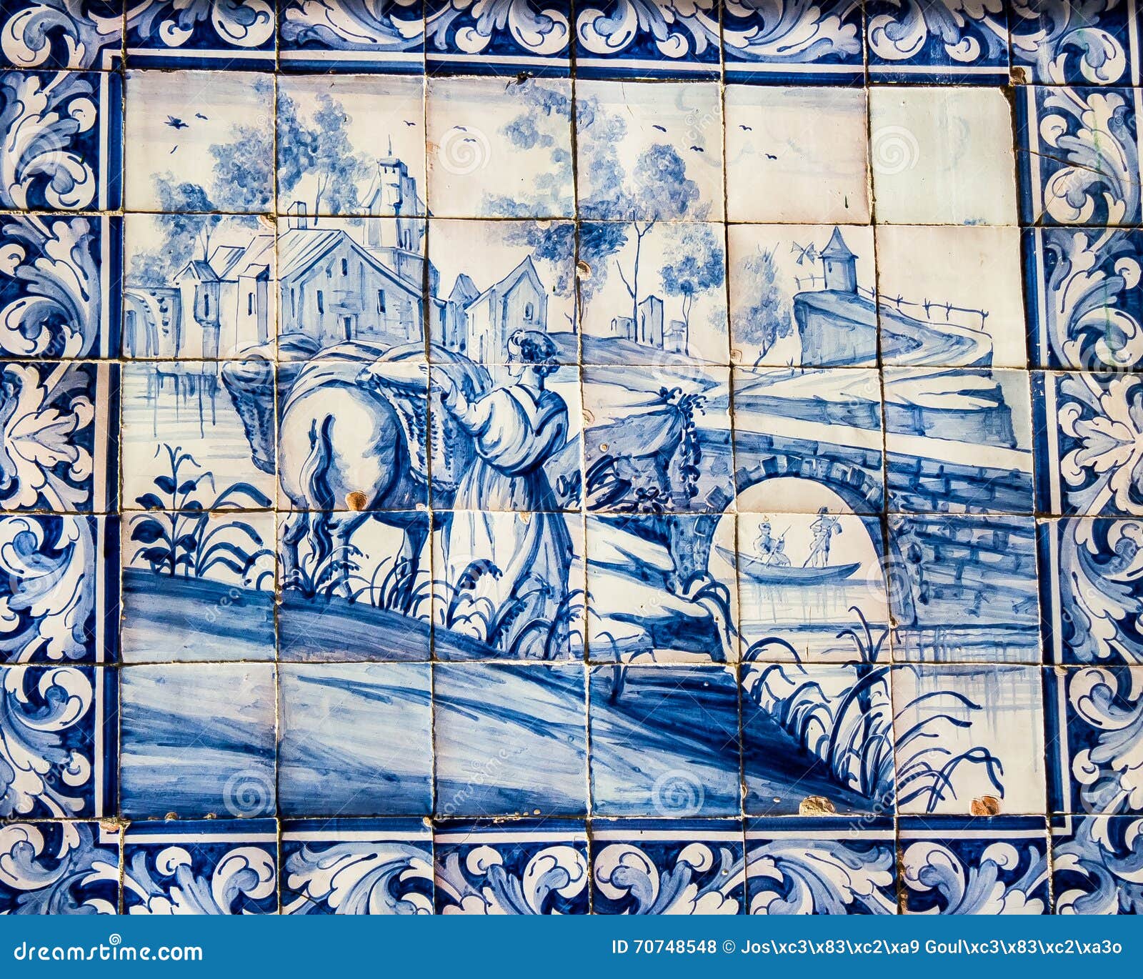 lisbon, portugal: tiles with bucolic scene in loios square, mouraria quarter
