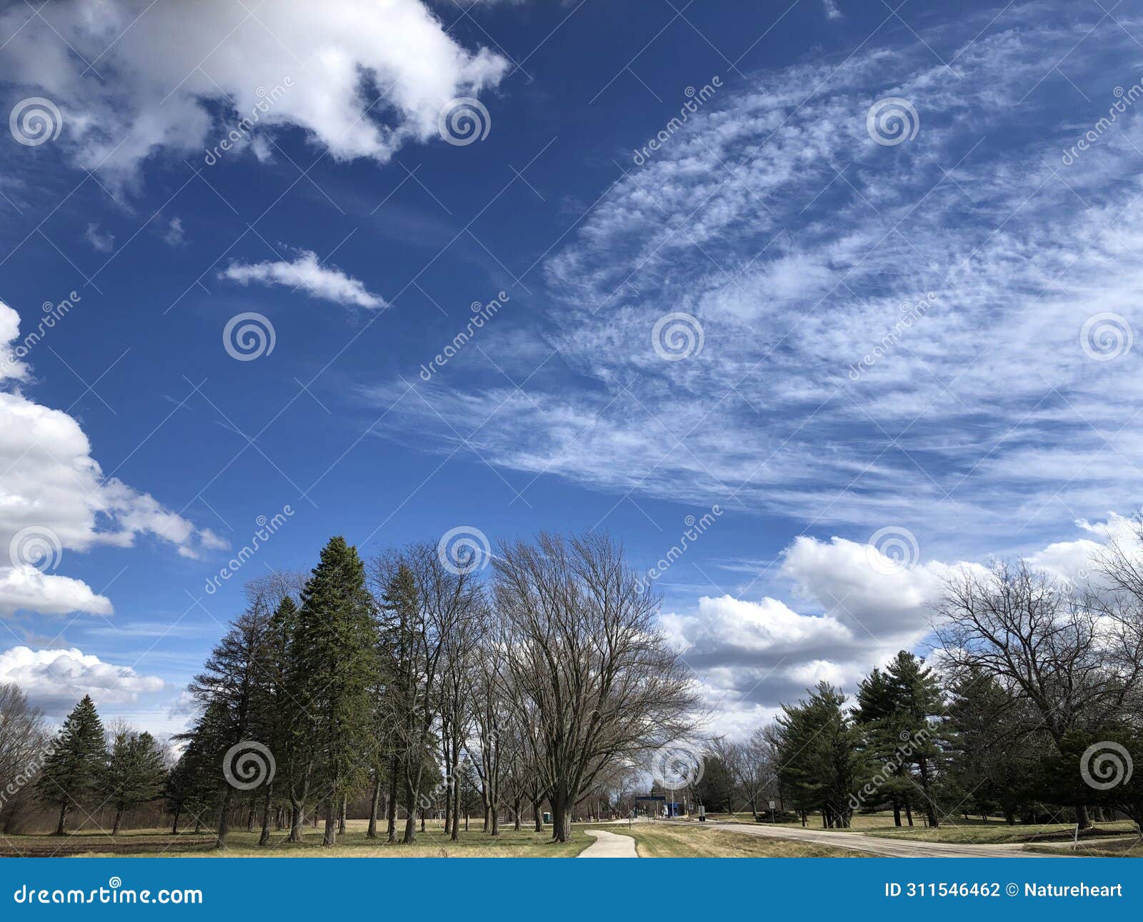 deep blue sky with various white clouds