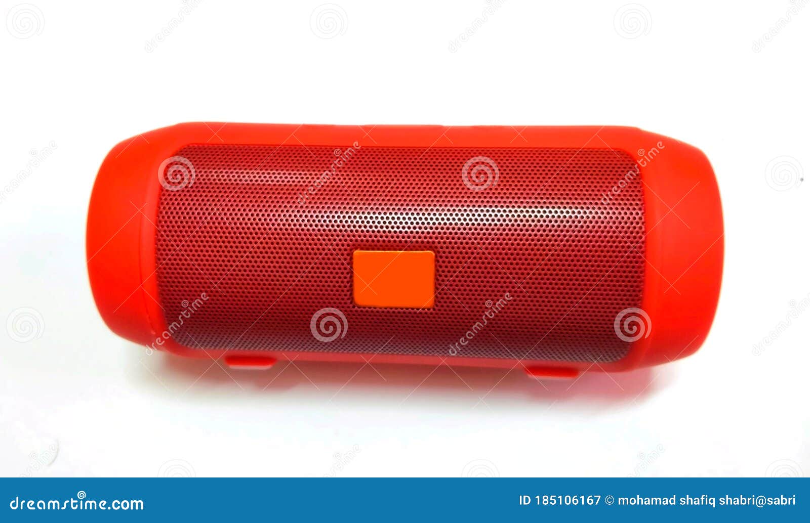 listening music with red speaker bluetooth portable.