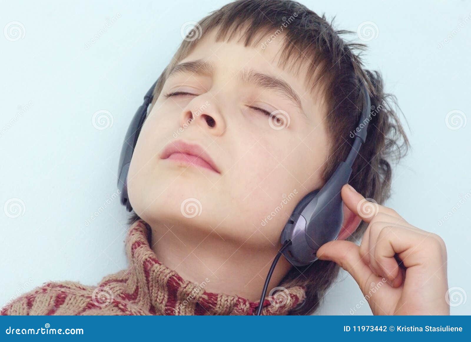 Boy is listening to music