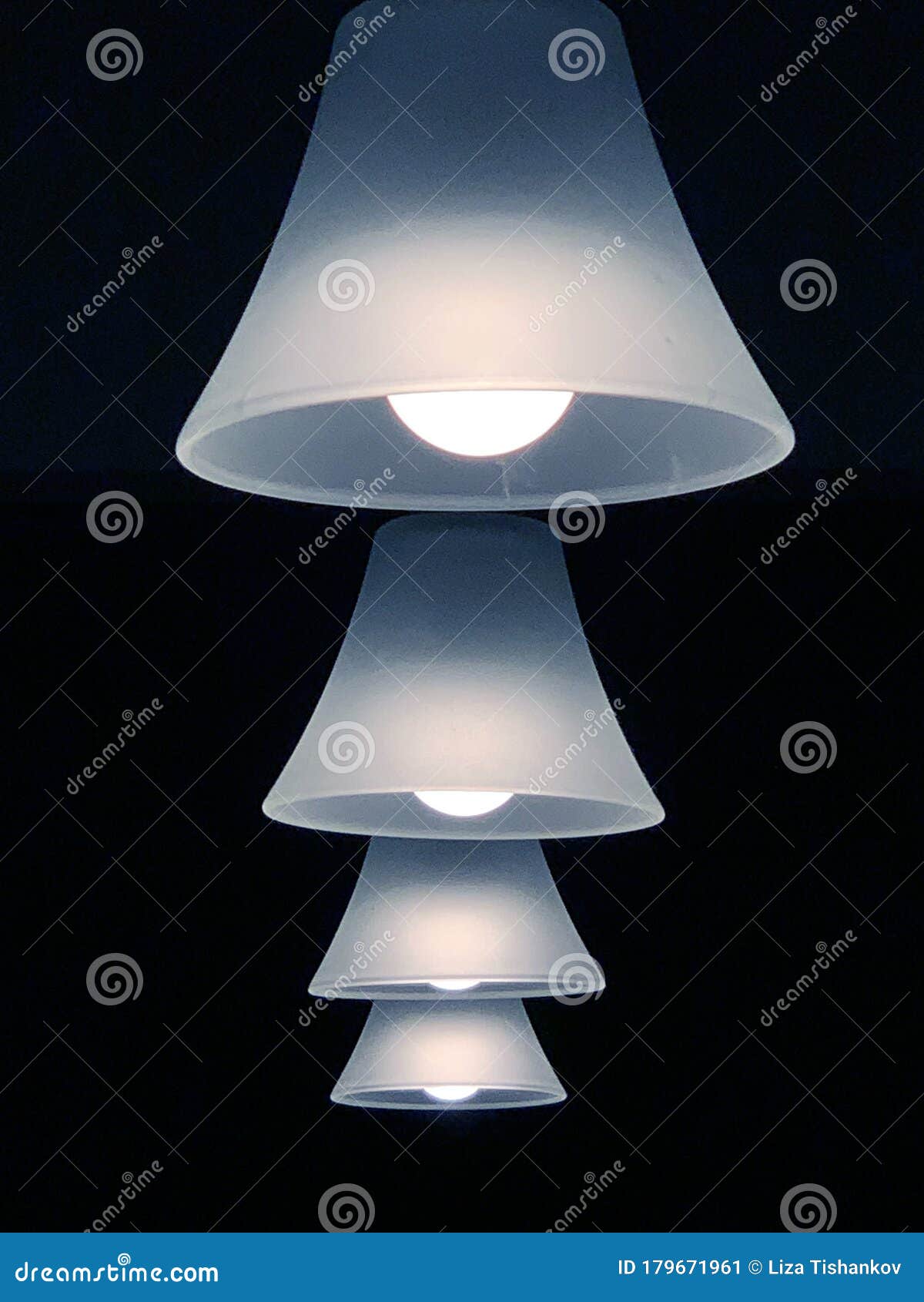 Lit lamps in line stock image. Image of line, lampshades 179671961