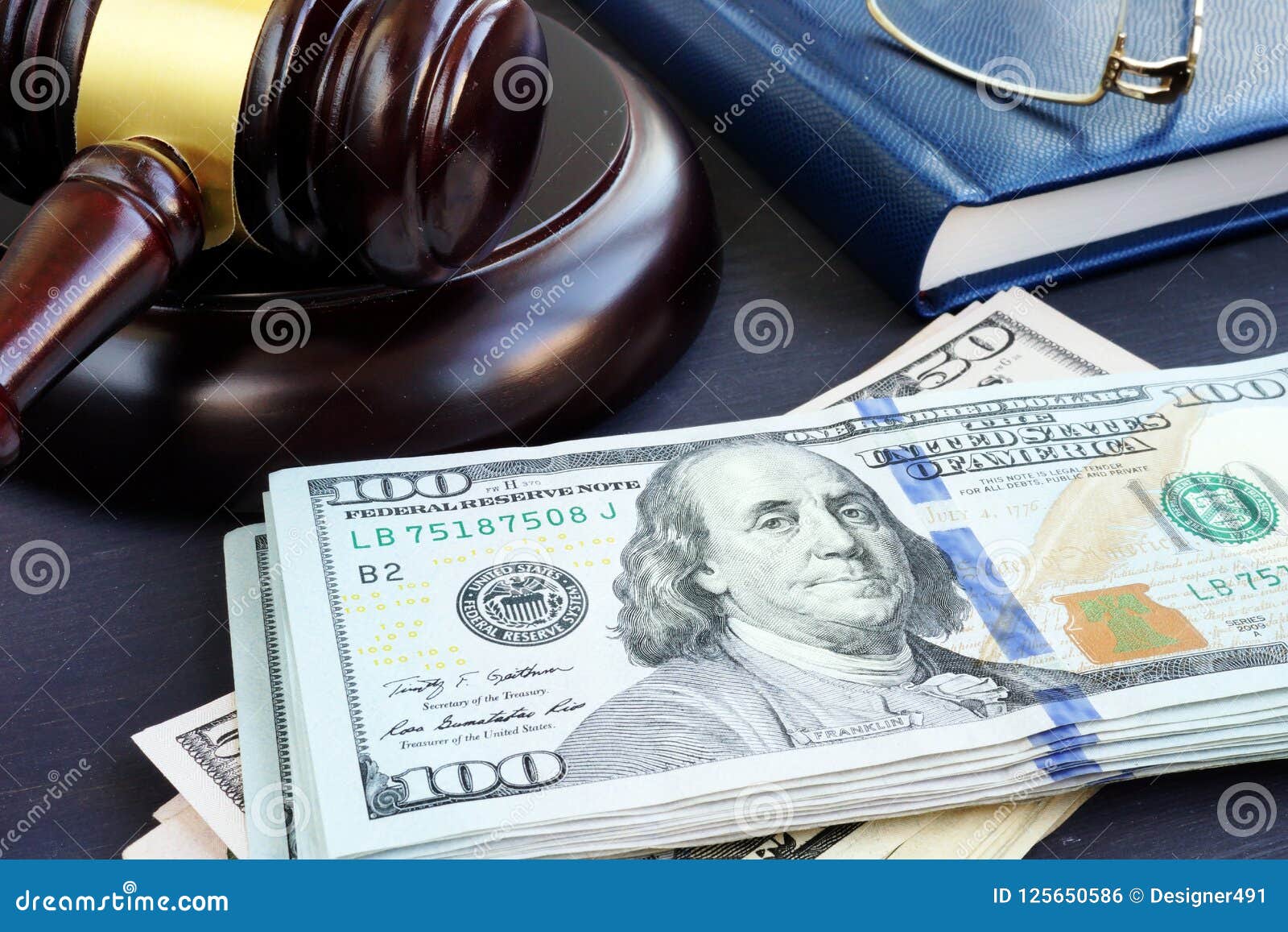 litigation finance. gavel and dollar banknotes. bail bonds.