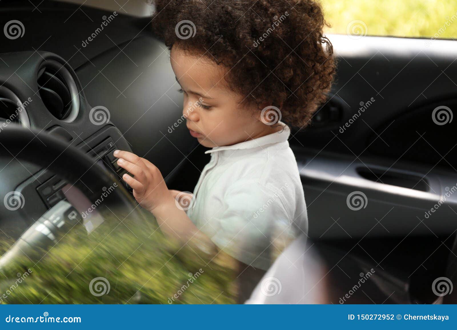 Little African-American Girl Alone Inside Car Stock Photo - Image of ...