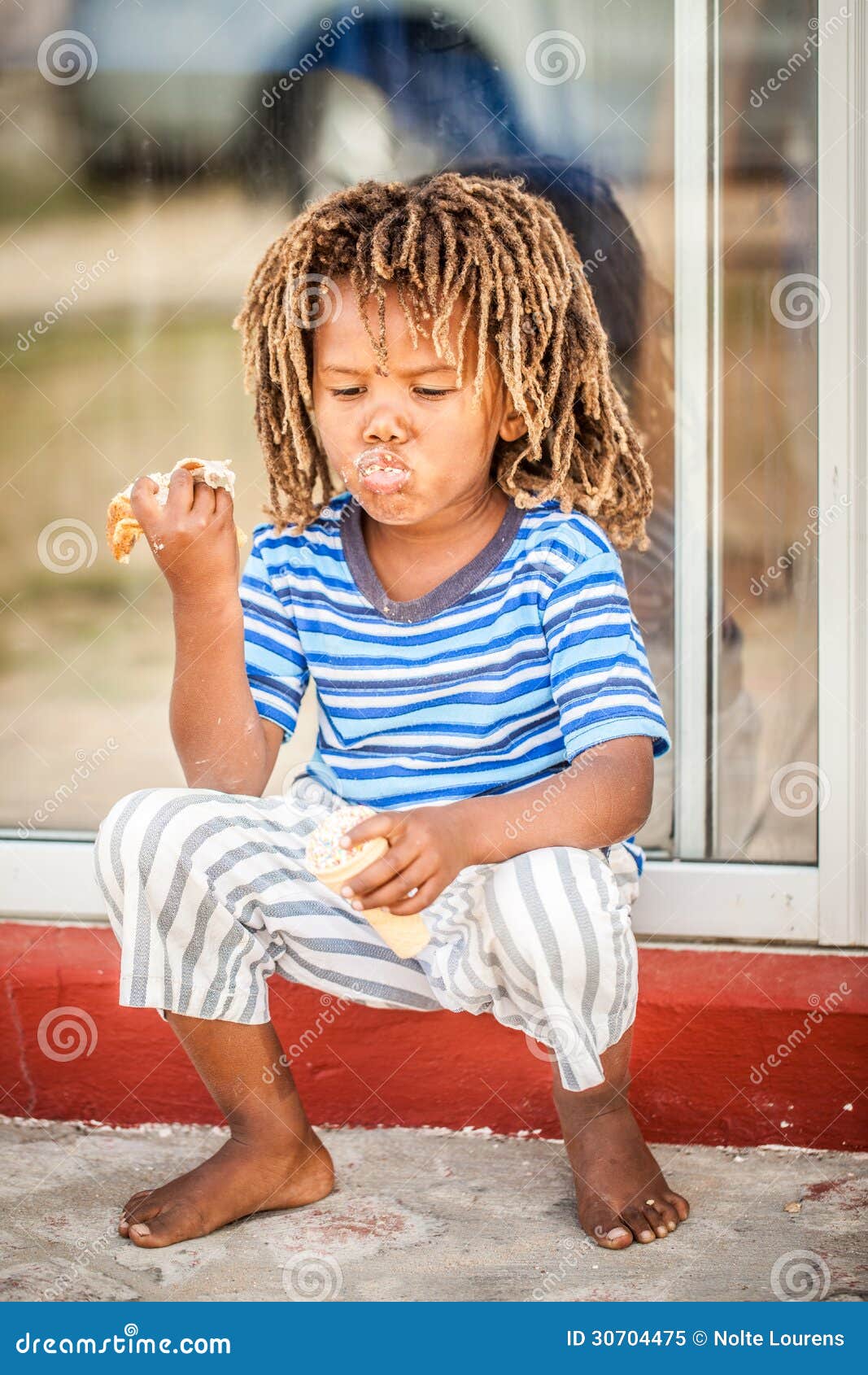 Little African Boy Eating Bread Stock Image Image Of Blue