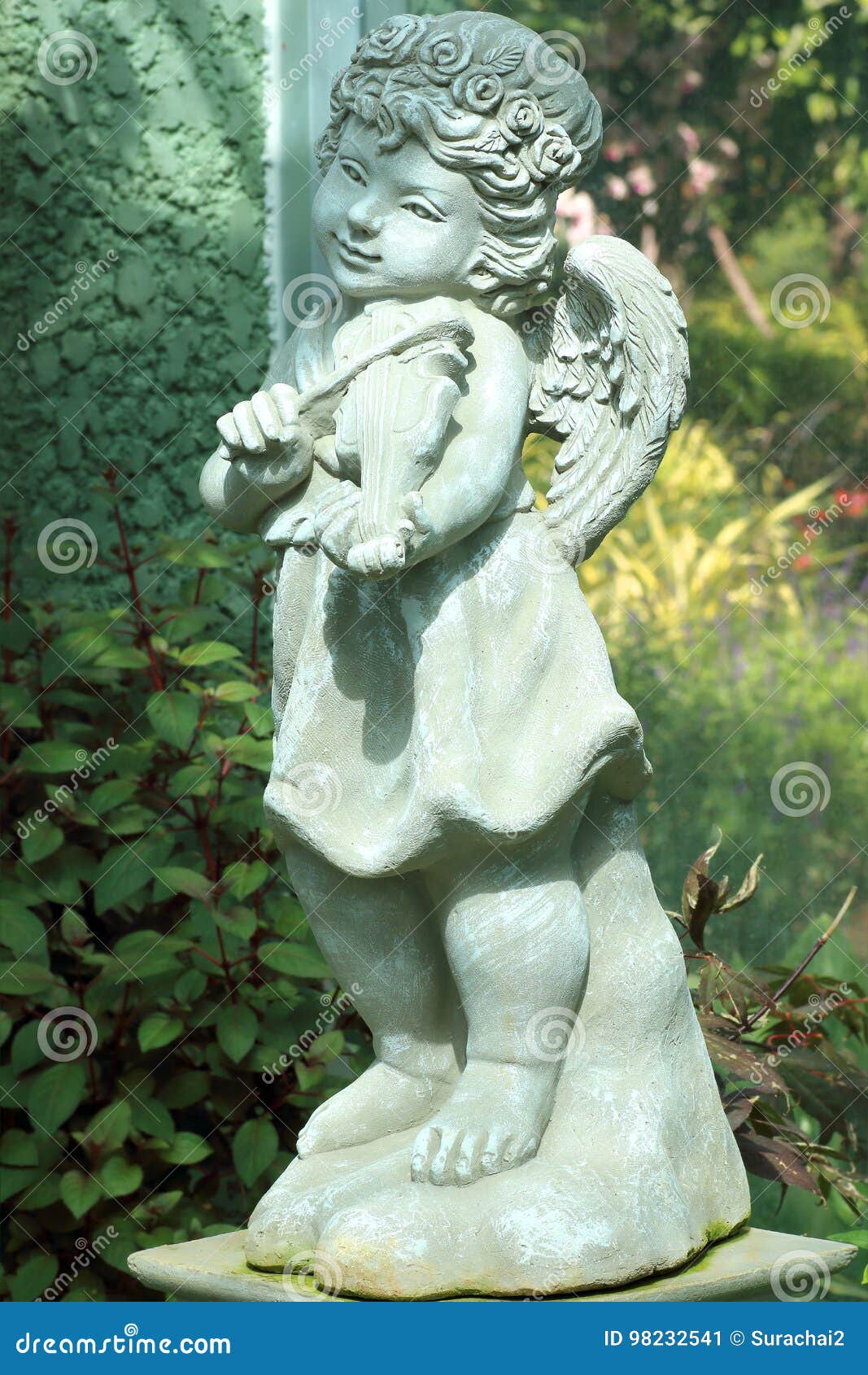 Little Angel Statue in Flower Garden Stock Image Image of statue