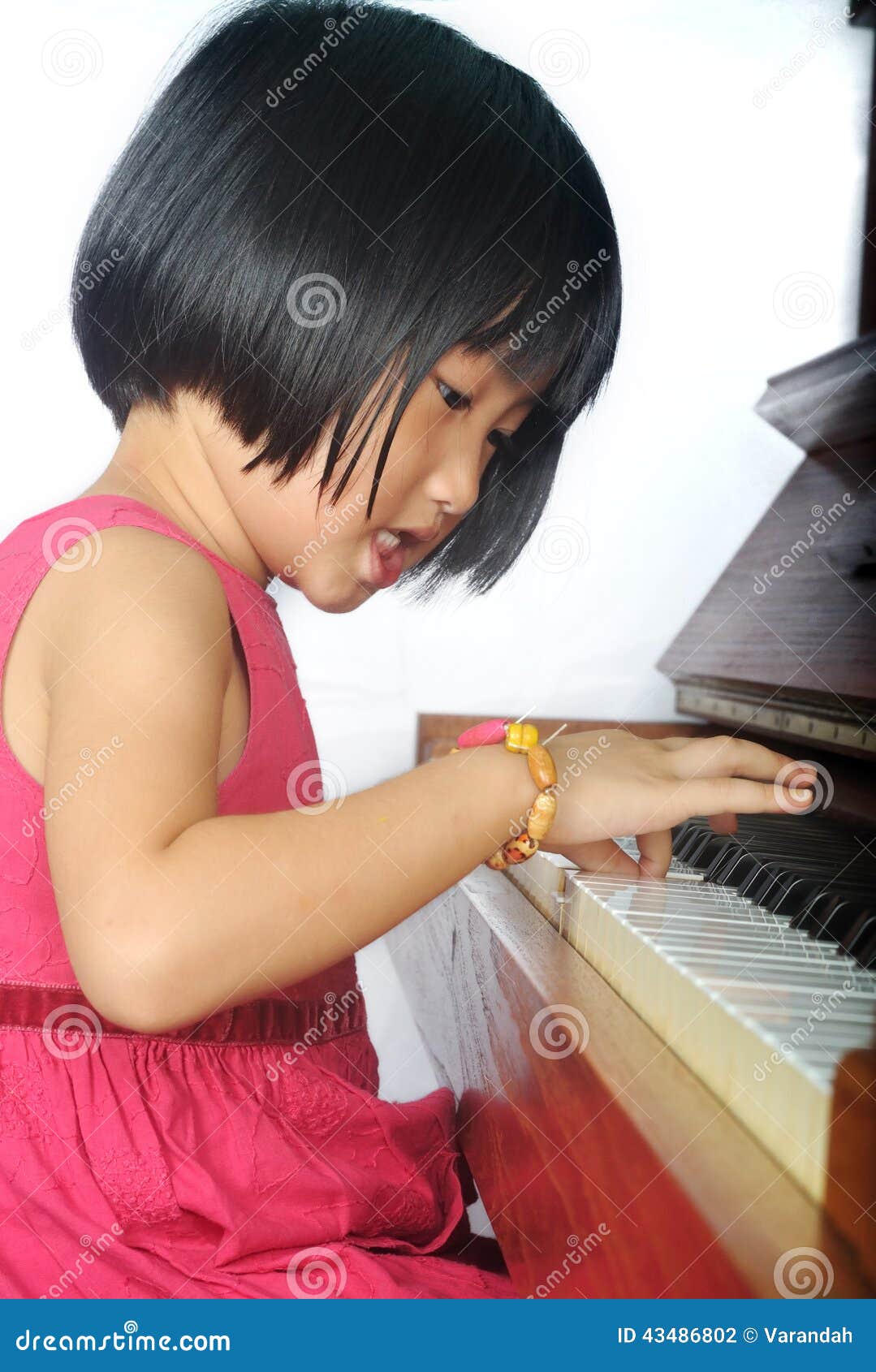 Little Asian Child Playing the Piano Stock Photo - Image of finger