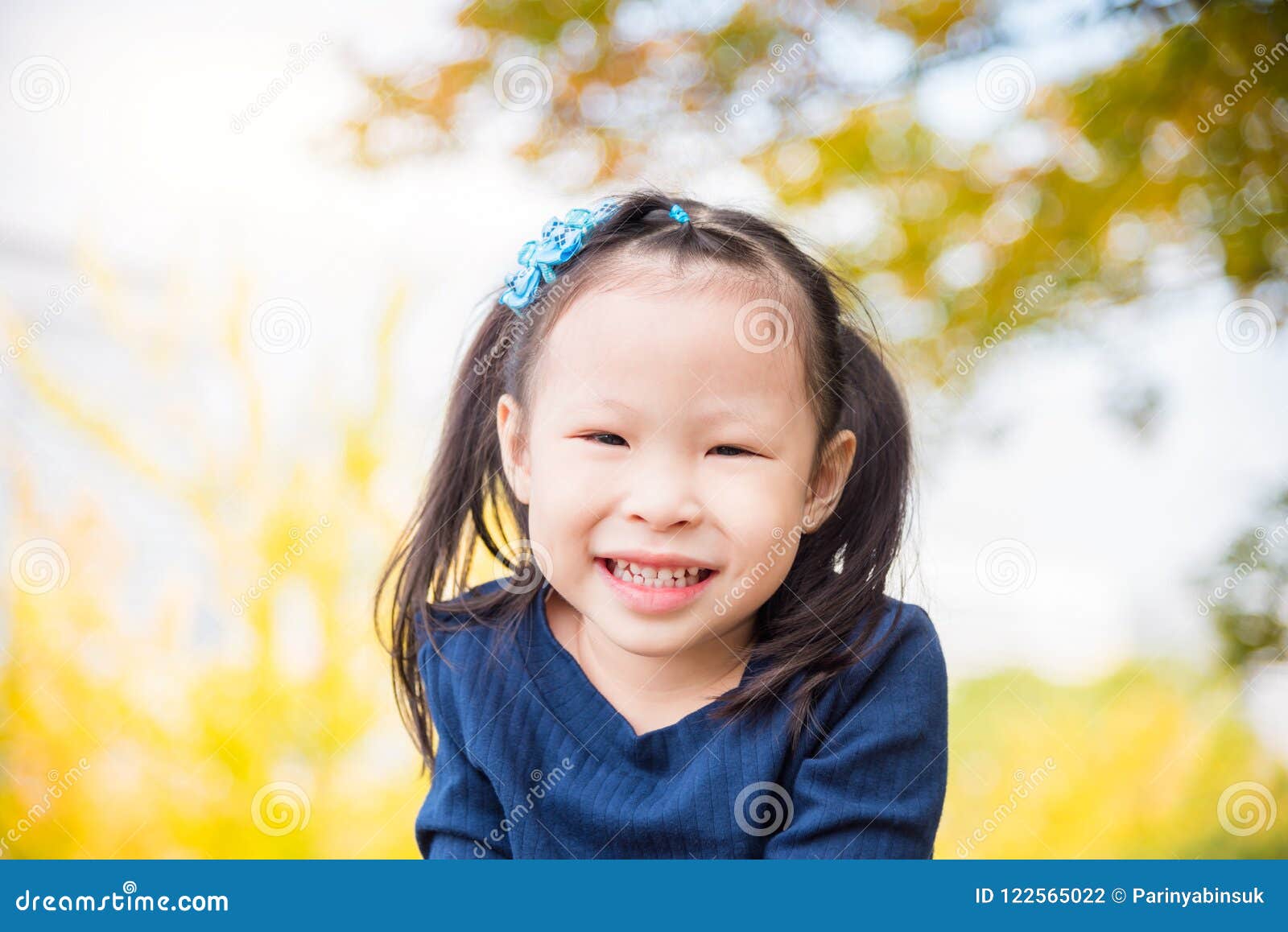 Girl Smiling in Autumn Park Stock Photo - Image of cute, natural: 122565022