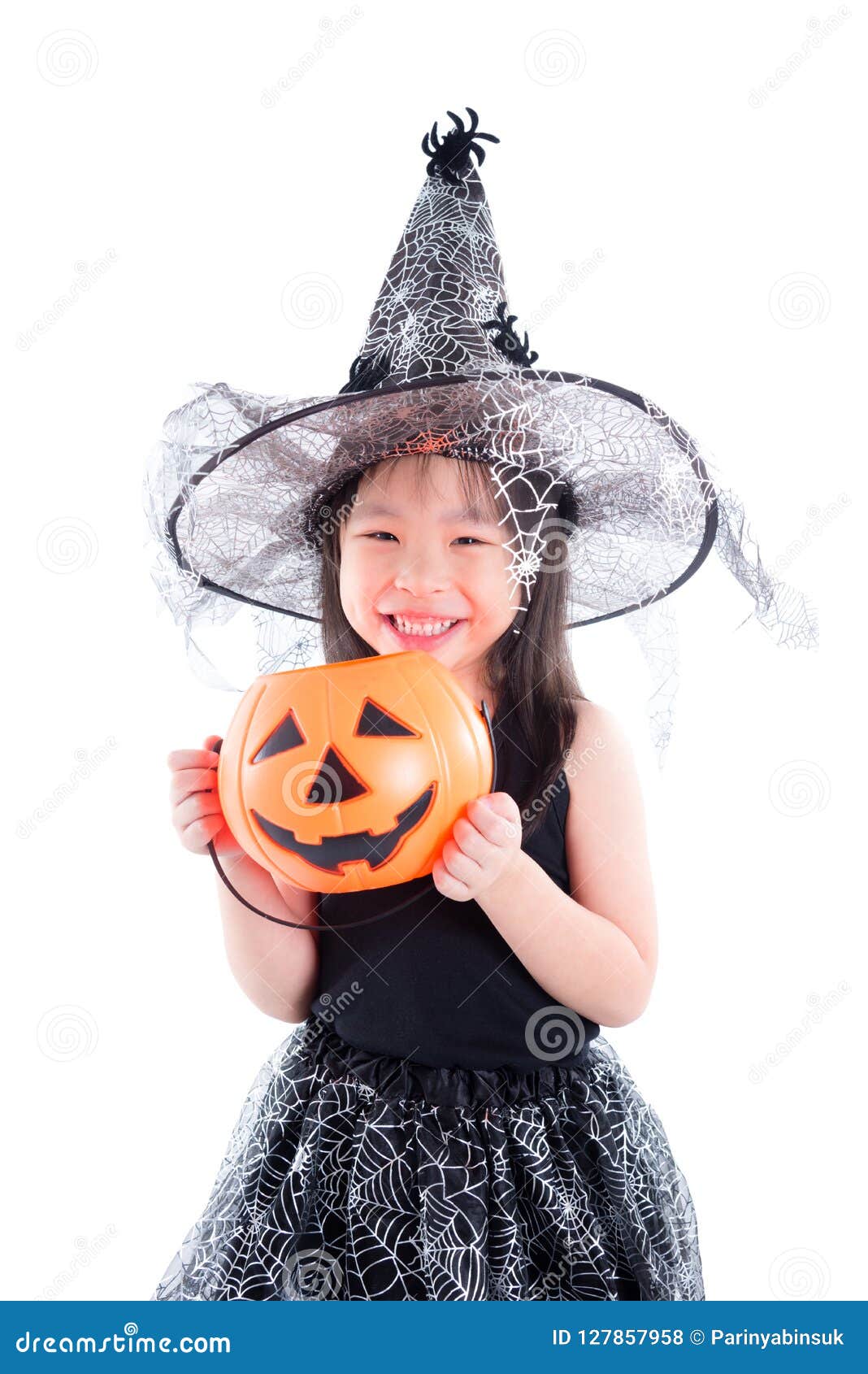 Little Asian Girl Wearing Witch Costume for Halloween Holding Pu Stock ...