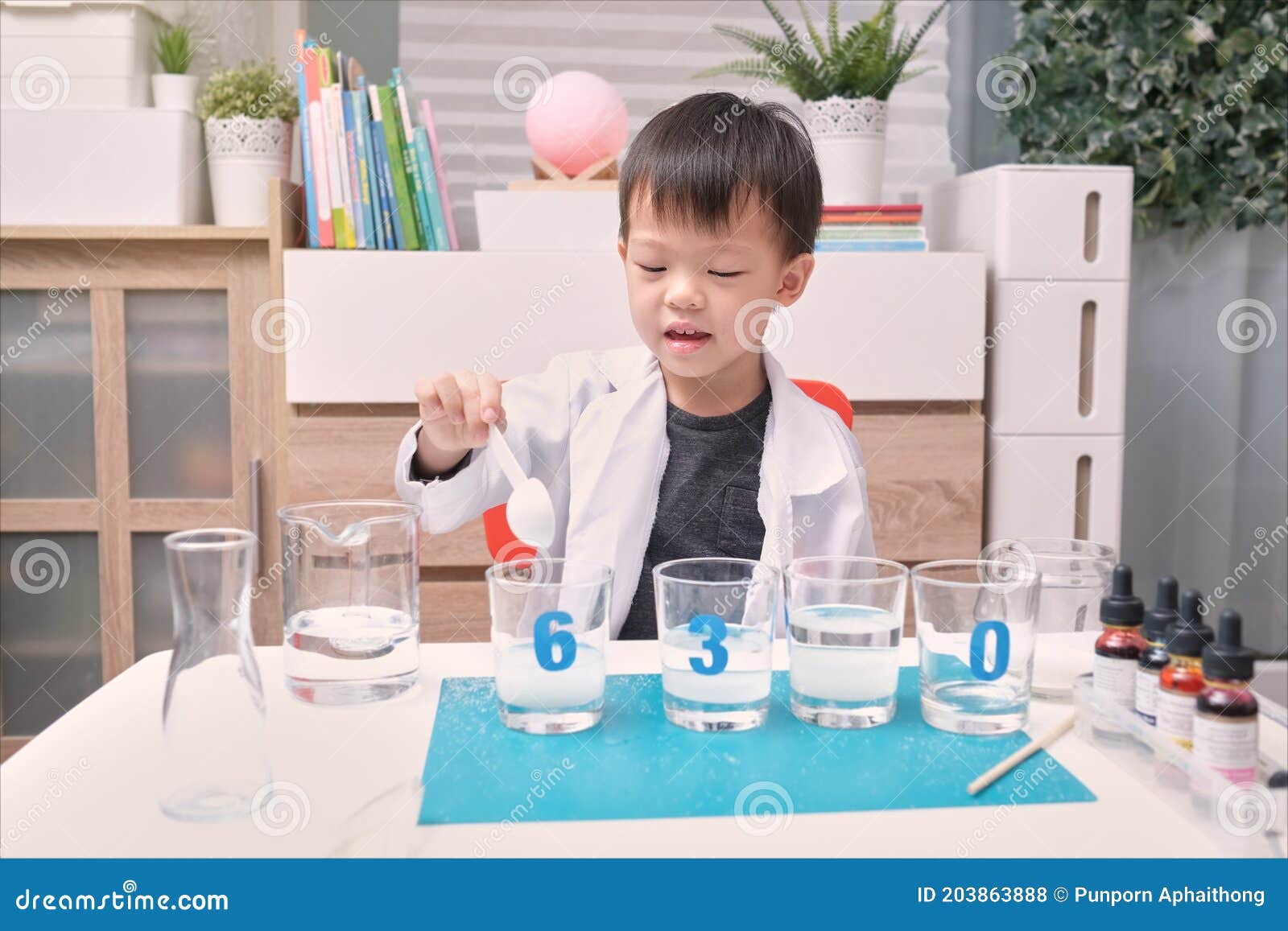 Little Asian Kindergarten Kid Studying Science, Making Sugar Water