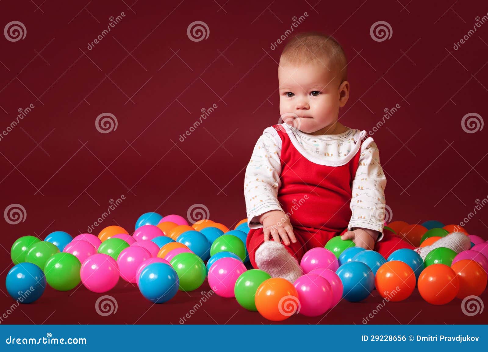 Little baby with balls stock photo. Image of attractive 29228656
