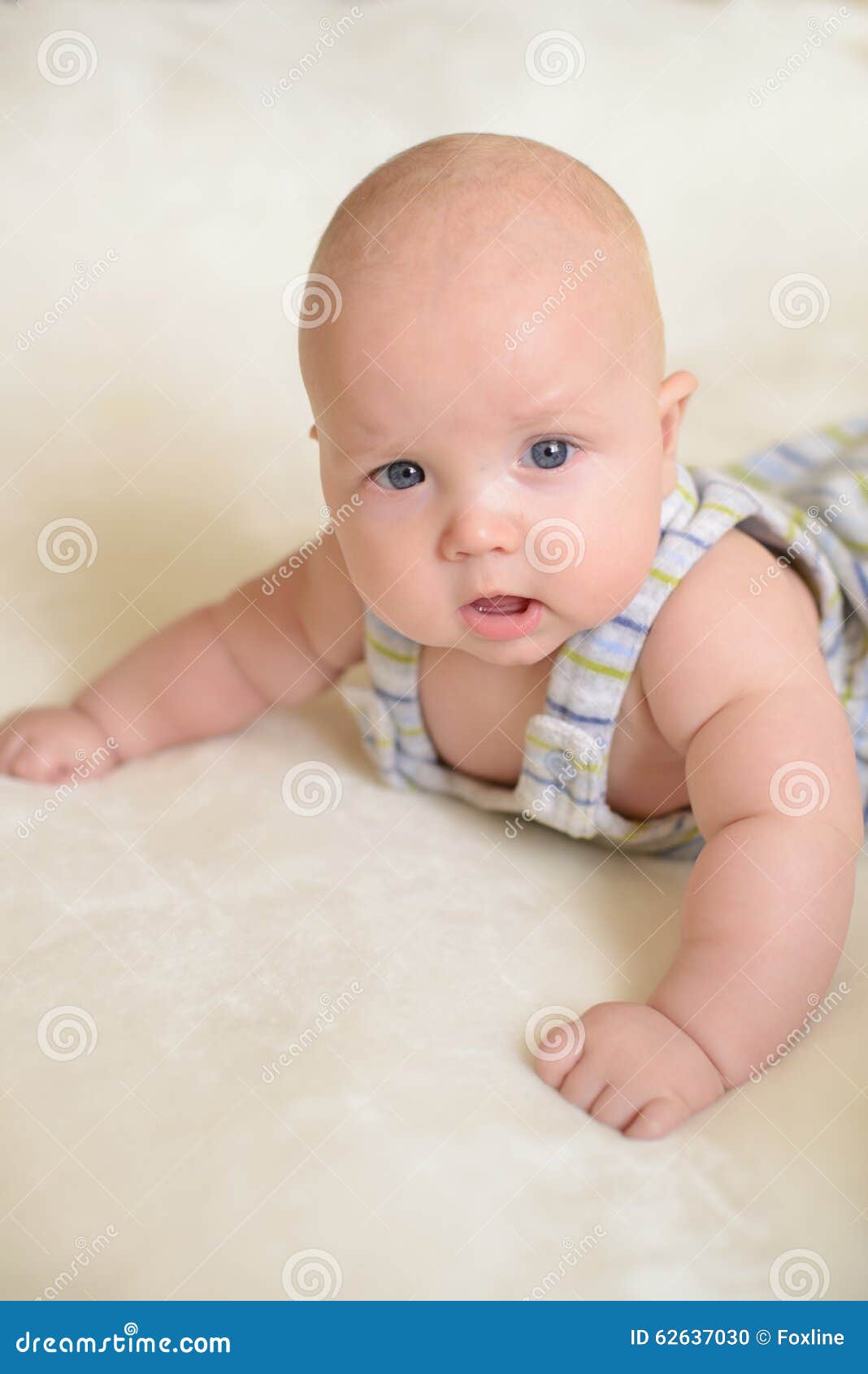 Little baby on the bed stock photo. Image of childhood 62637030