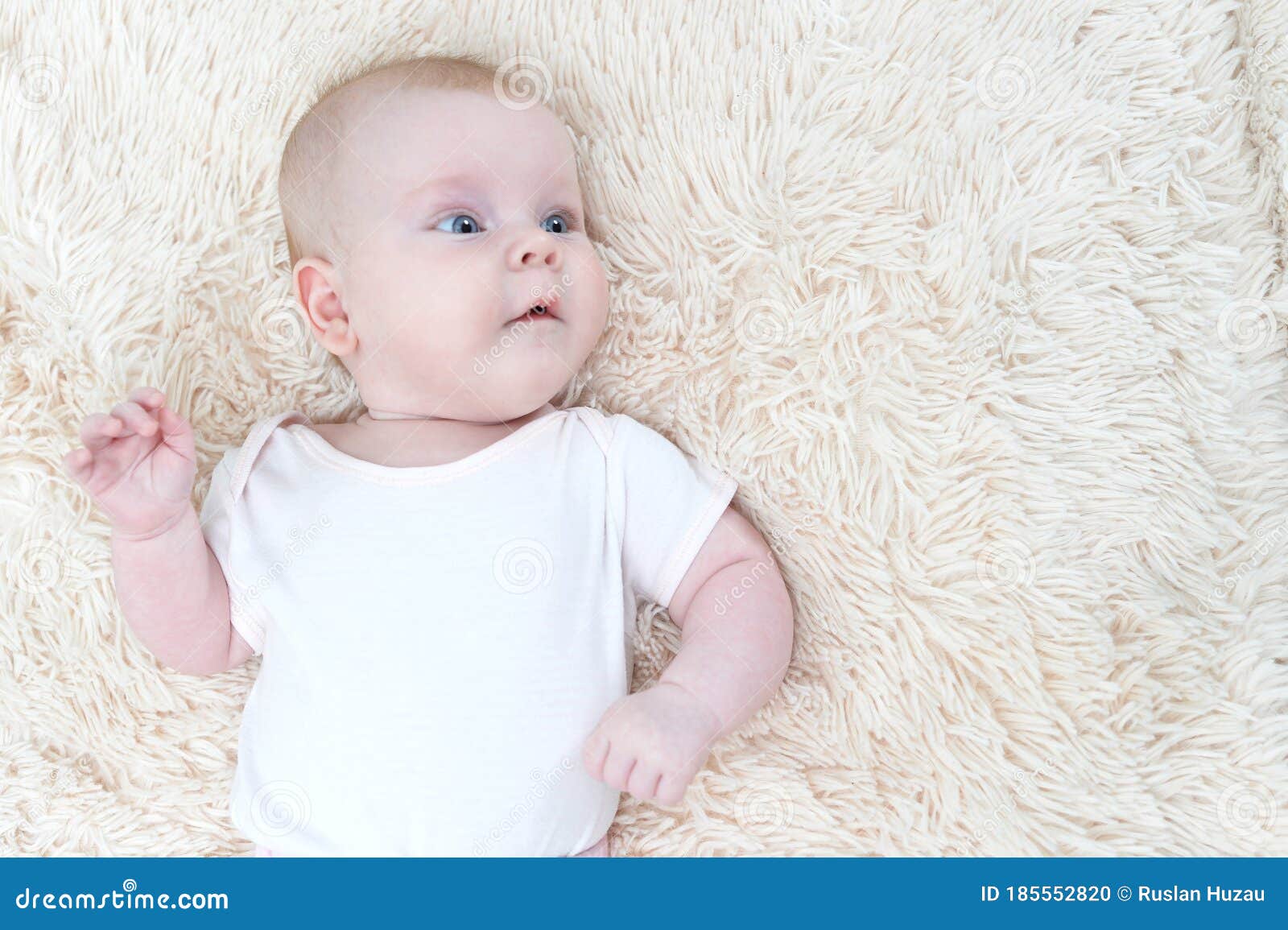 Little Baby Girl Lying on Fluffy Blanket Stock Photo - Image of ...