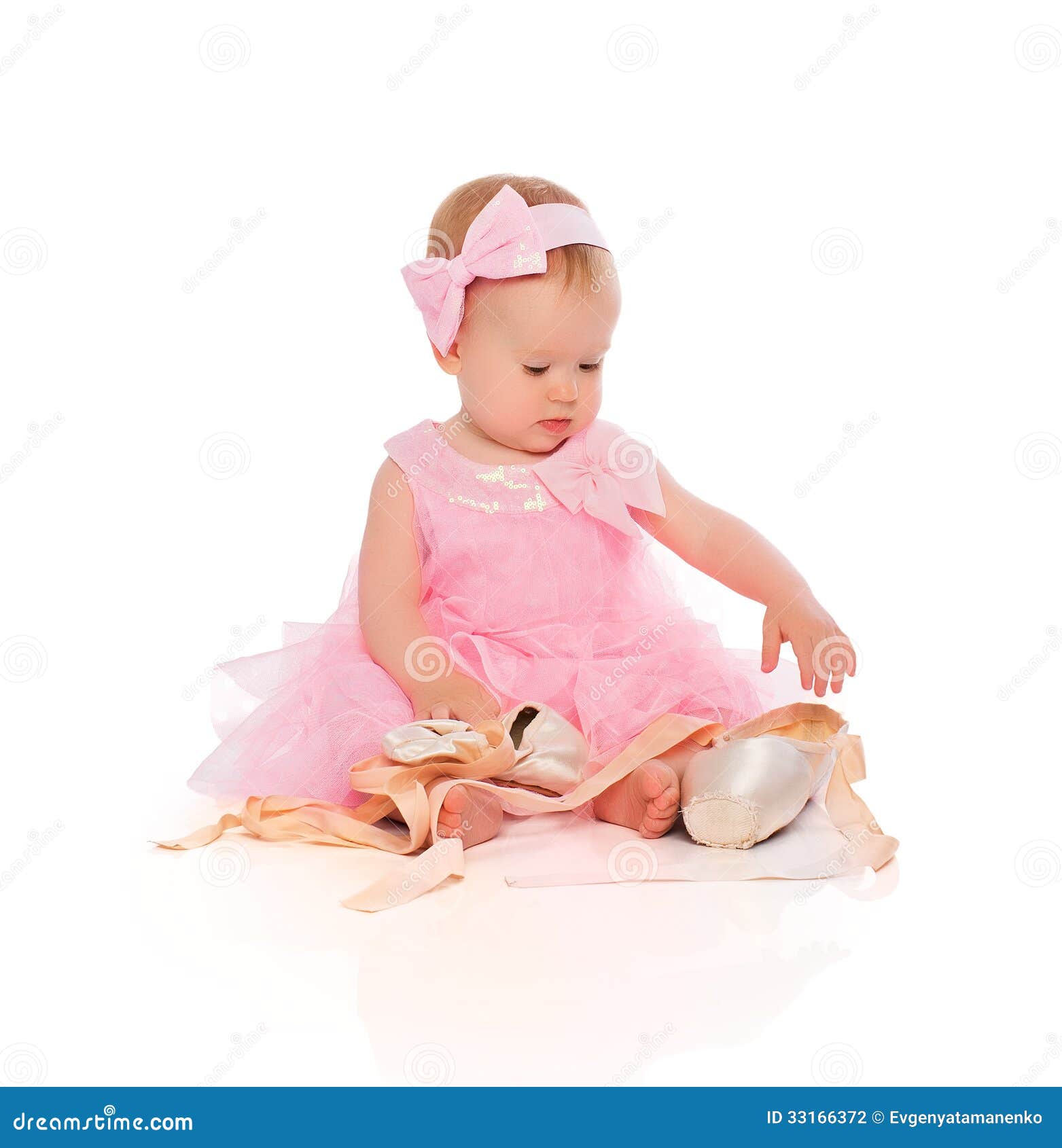 Little Baby Girl In A Pink Ballerina Dress With Pointe ...