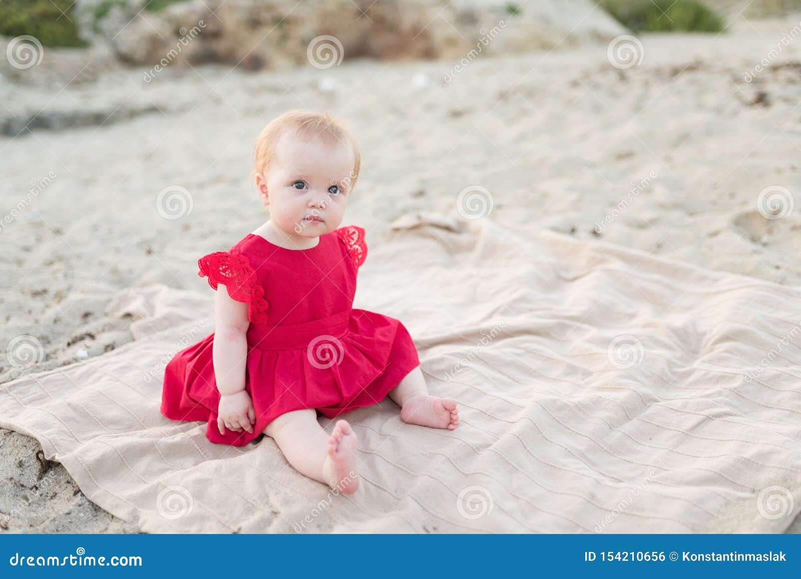 Little Baby Girl in Red Dress Stock ...