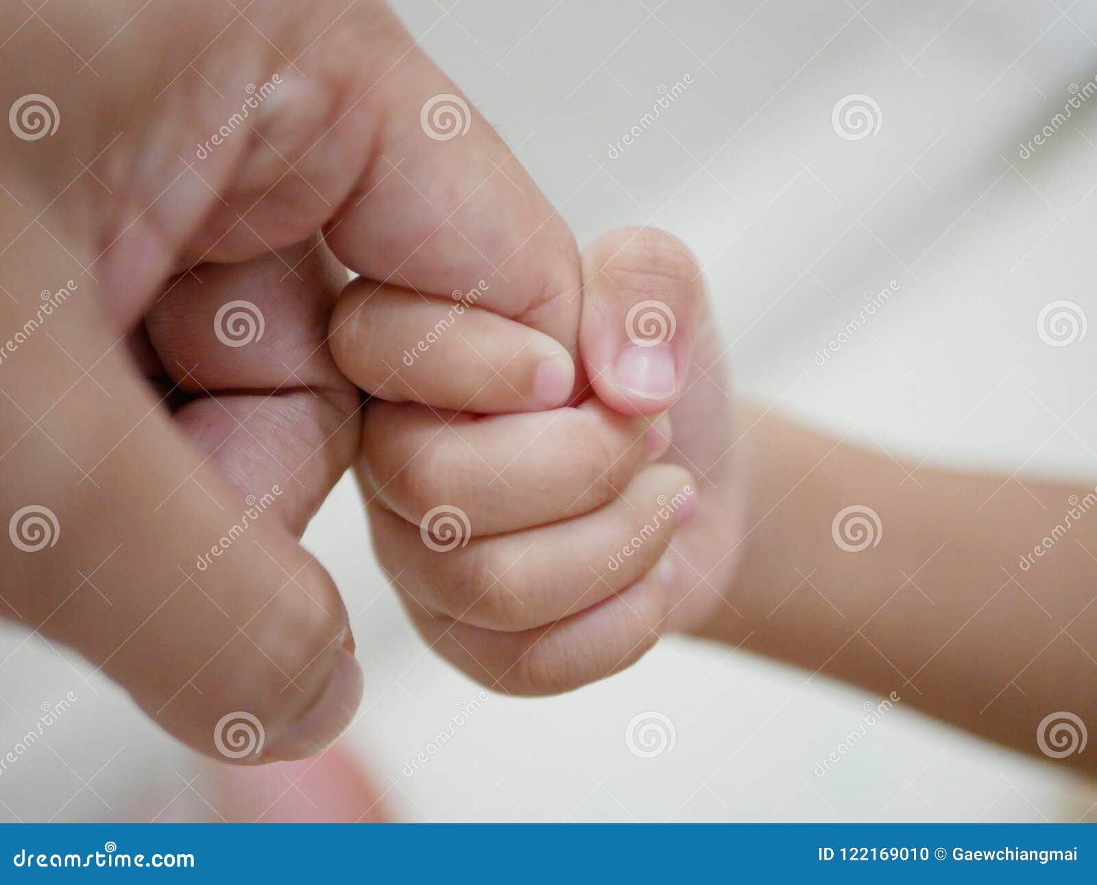 Little Baby Hand Holding Father`s Finger Representing Father-and ...