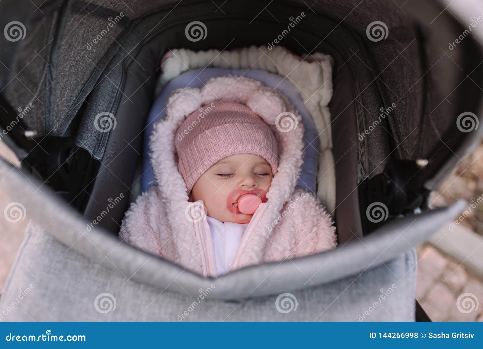 baby girl in stroller