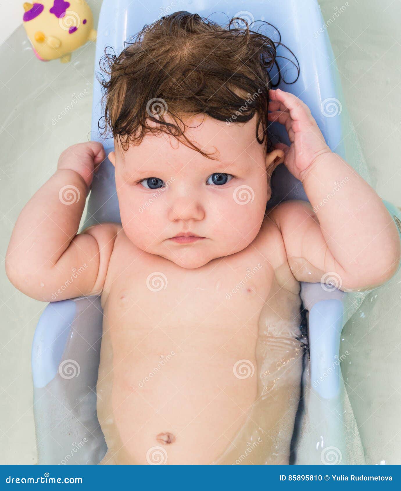 Little Baby Swims In The Bathtub. Stock Photo - Image of ...