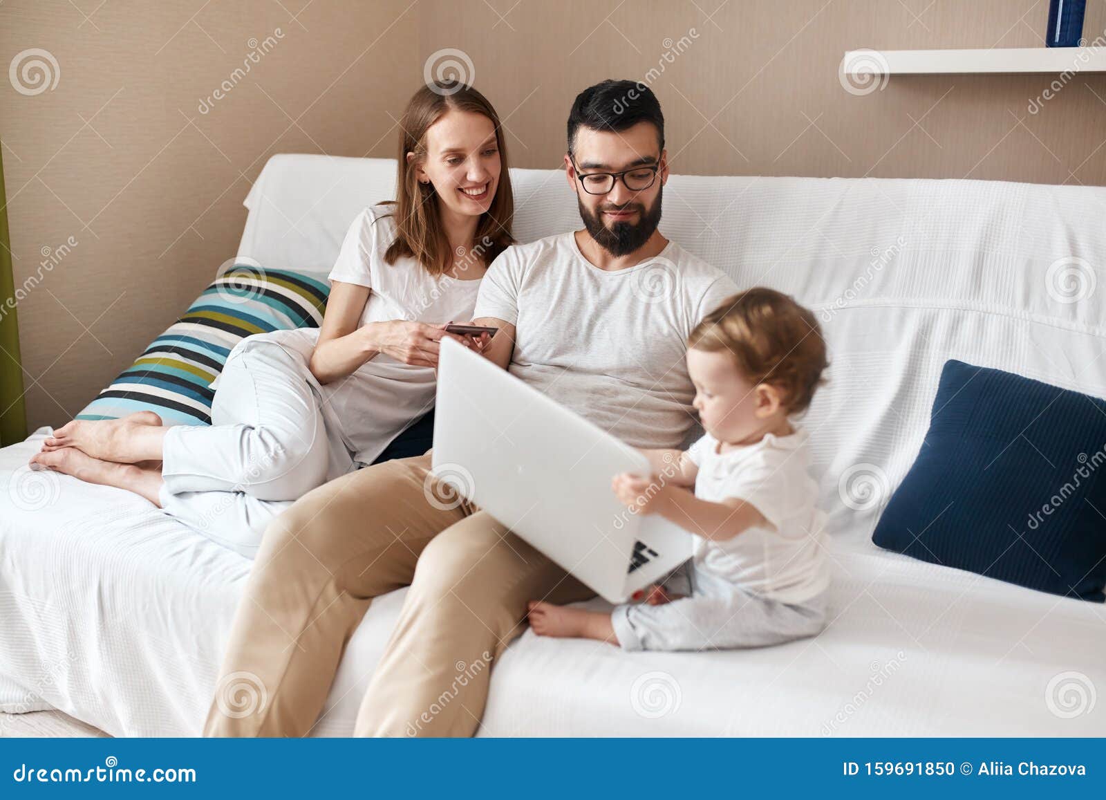 little baby using laptop, learining to type messages