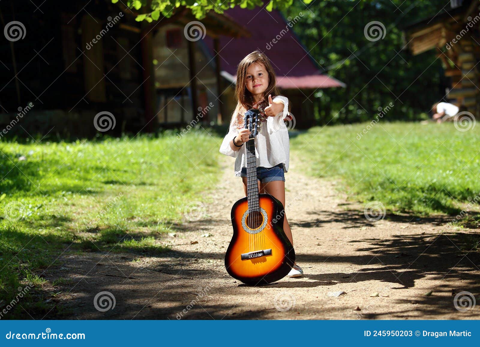 Guitar pose female Stock Photos - Page 1 : Masterfile