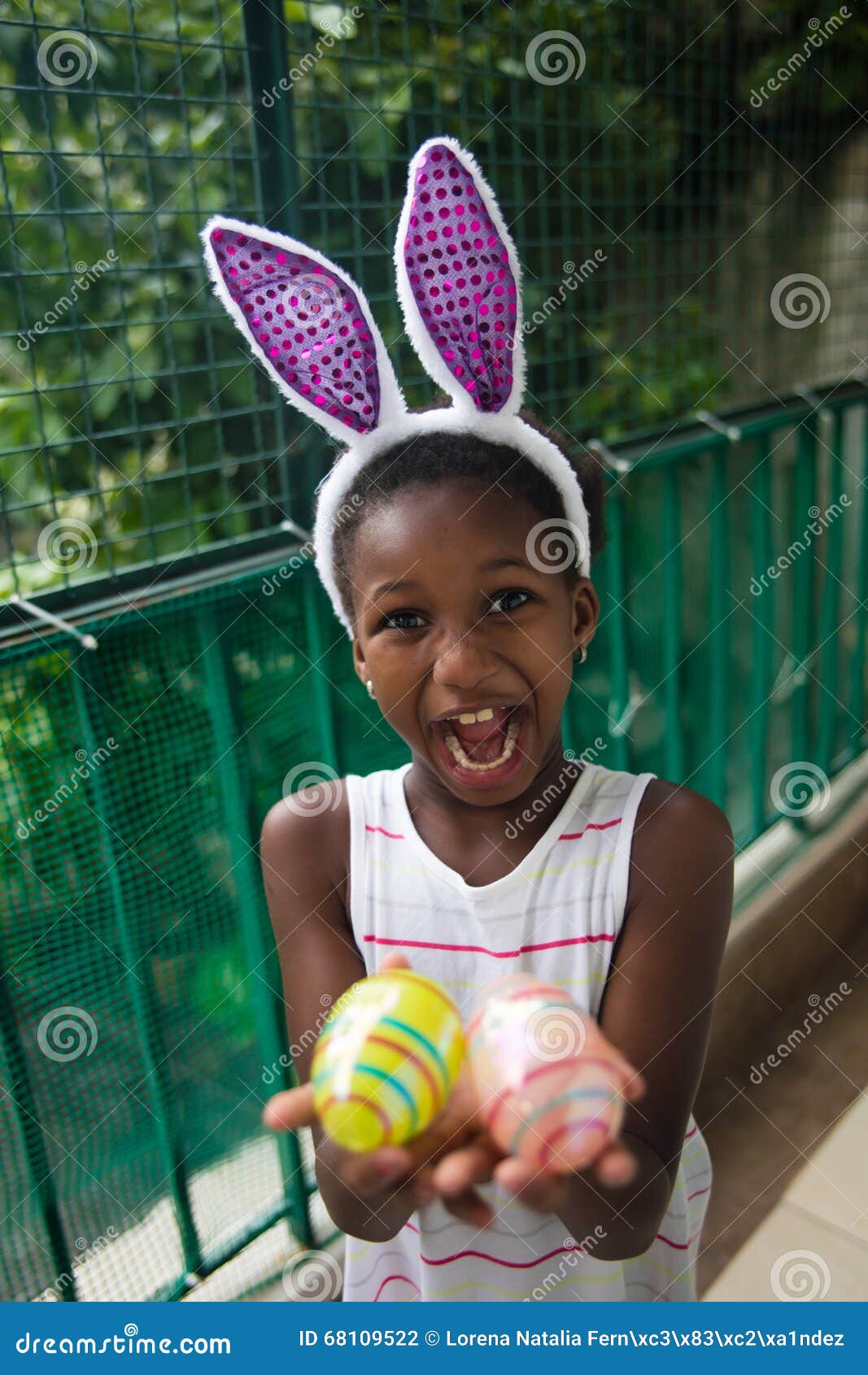 Little Black Girl Celebrating Easter. Stock Photo Image of smiling