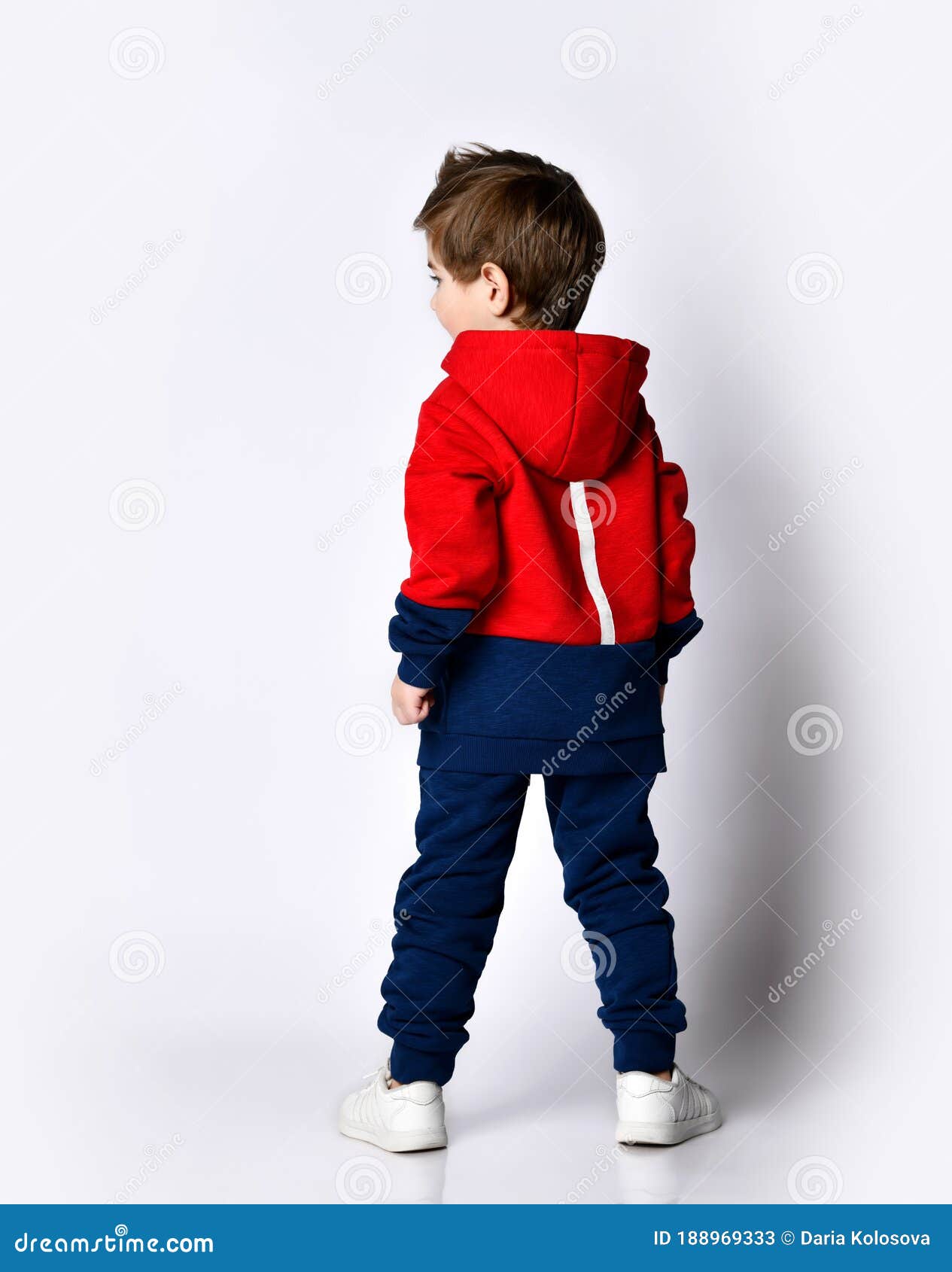 Little Blond Boy in Blue and Red Tracksuit, Sneakers, Sunglasses ...