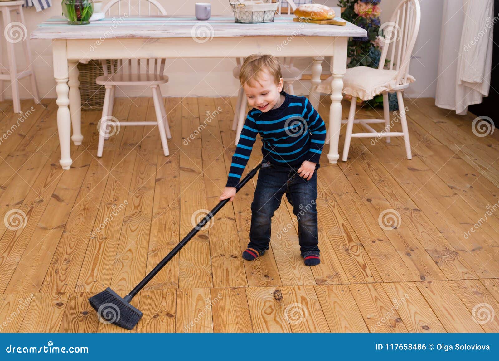 Little Blond Boy Sweeping the Floor in the Kitchen. Pretty Boy 3 Yers ...