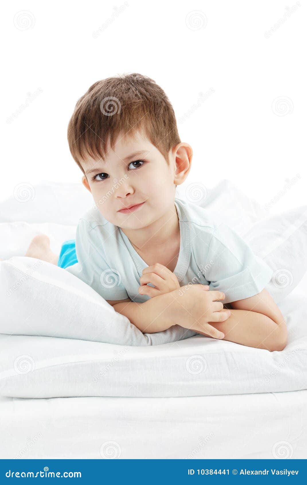 The little boy on a bed stock image. Image of child, home 10384441