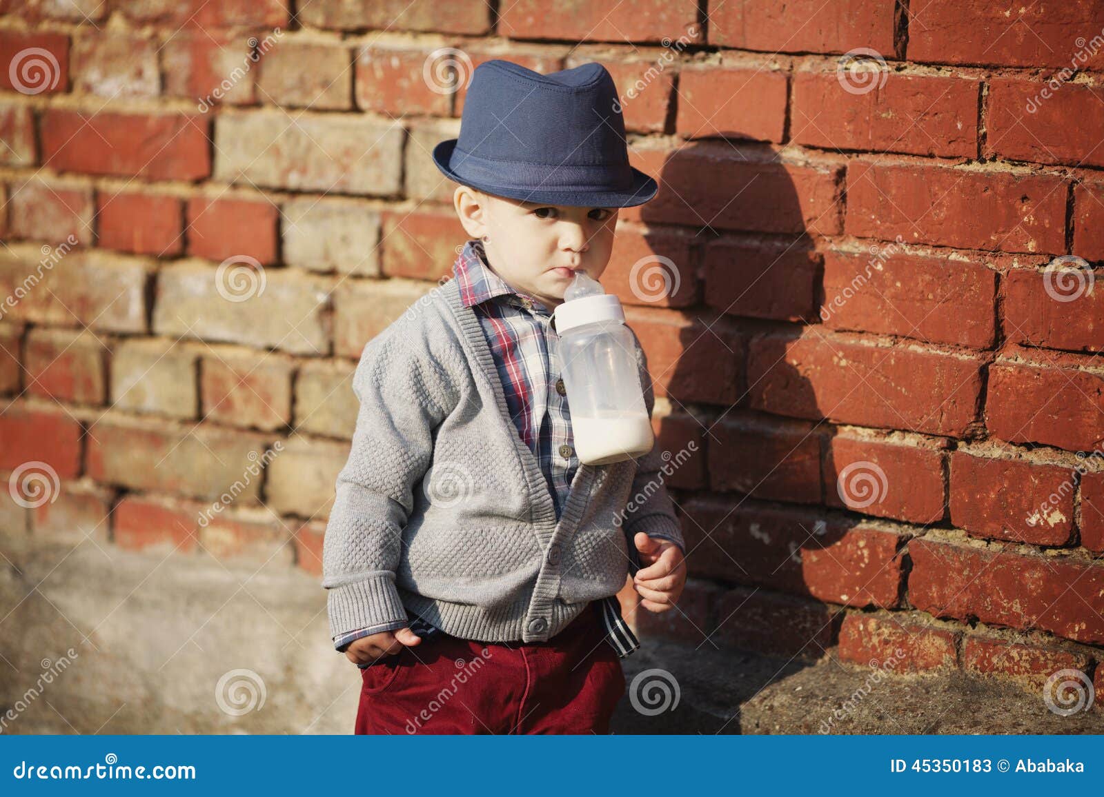 Little Boy with Bottle in Mouth Stock Image Image of child, baby