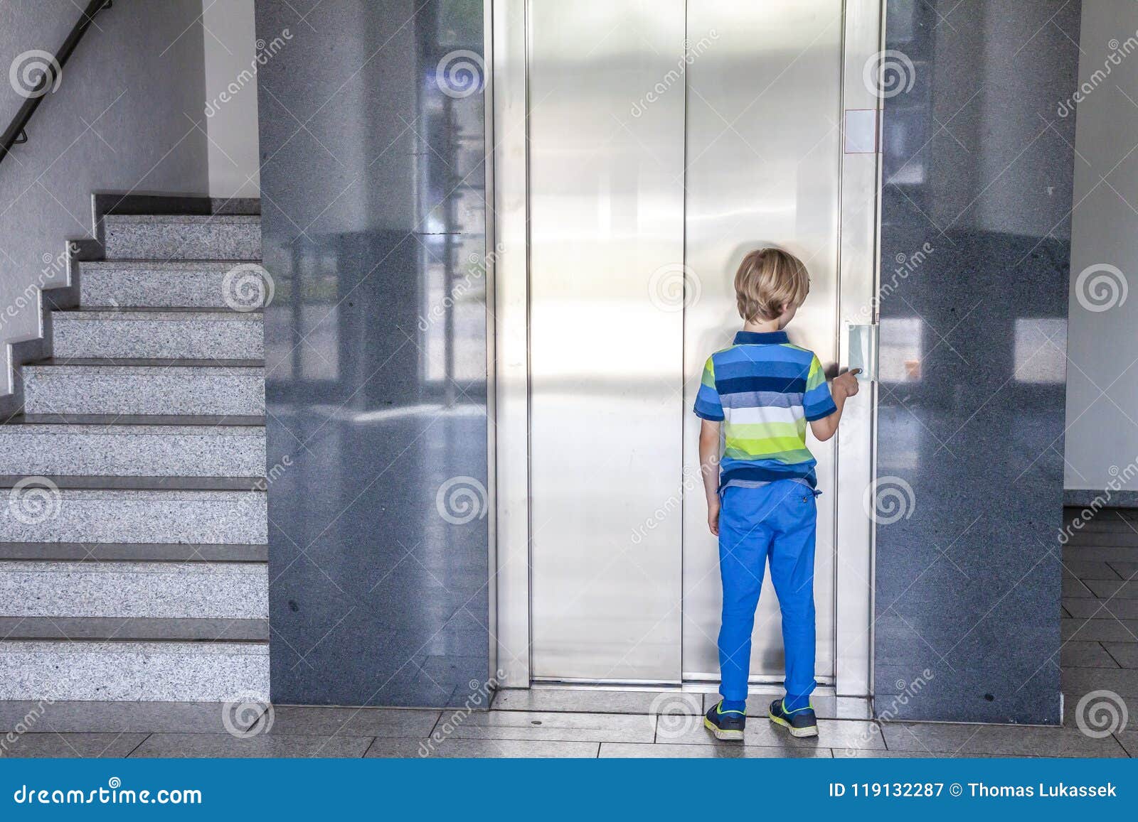Little Boy is Calling the Elevator Stock Image Image of childhood, alone 119132287