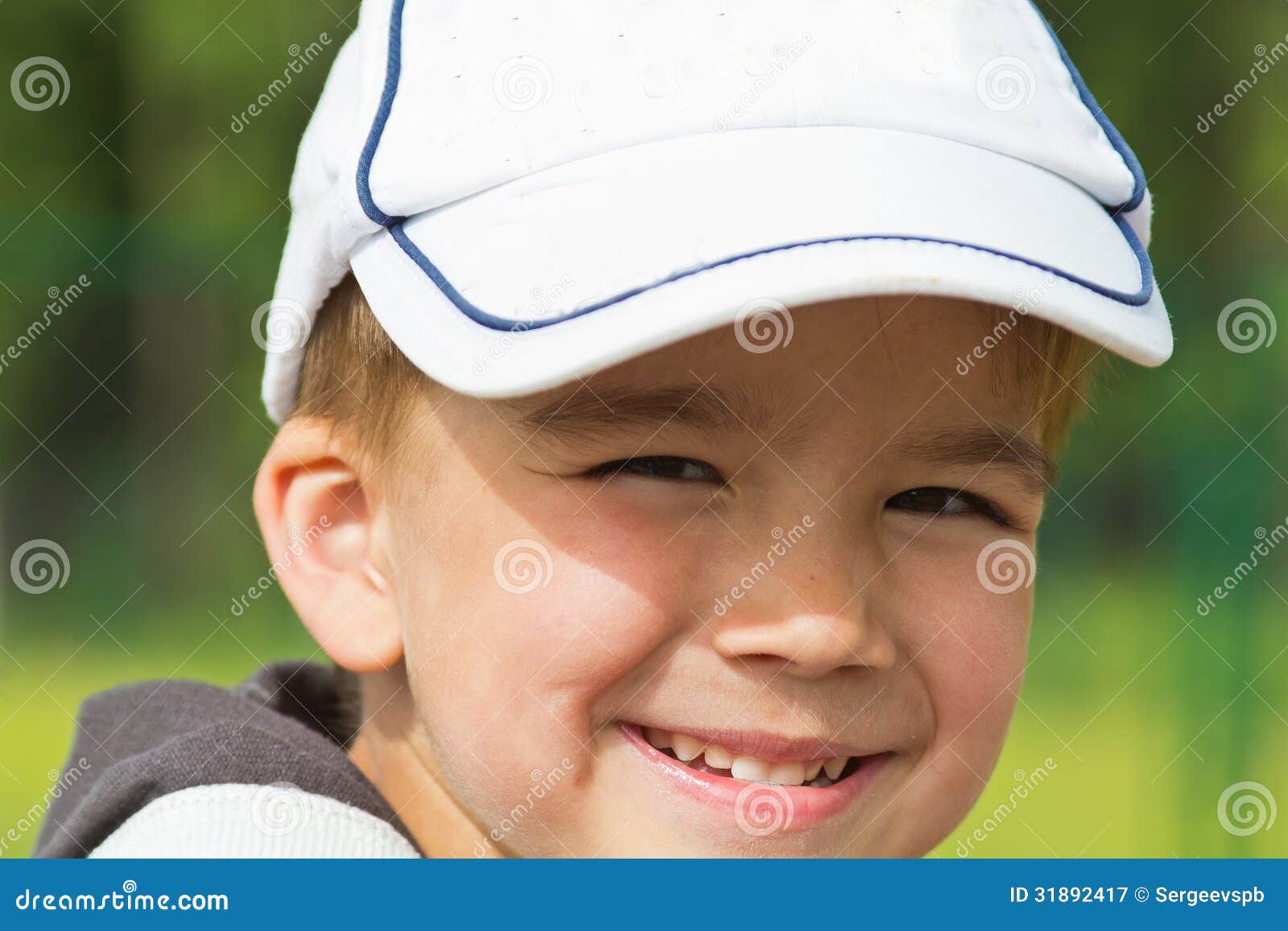 Little boy in a cap stock image. Image of innocent, cute 31892417