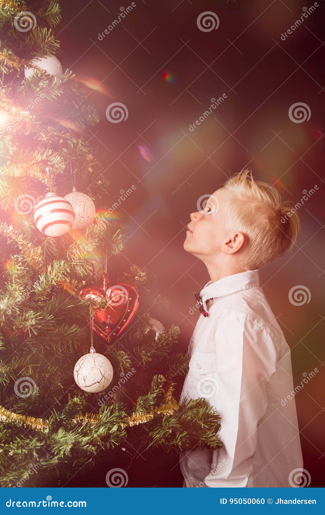 little boy celebrating the magic of christmas