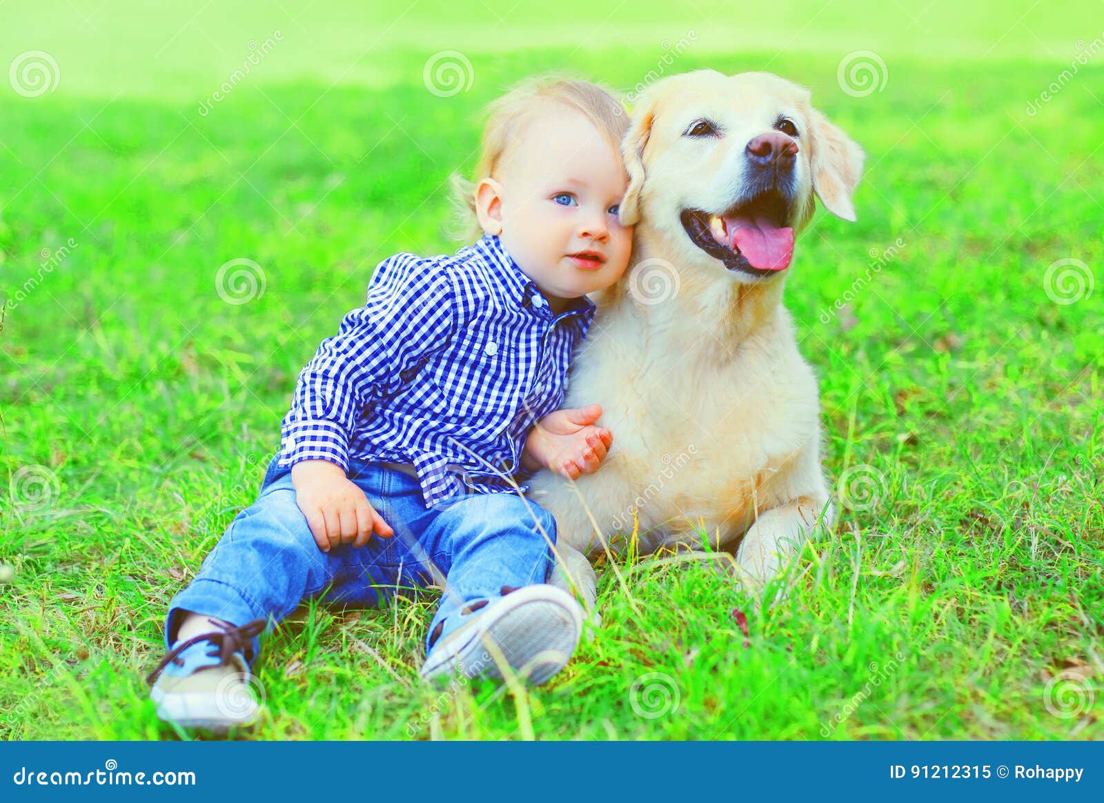 Little Boy Child and Golden Retriever Dog is Sitting Together on the ...