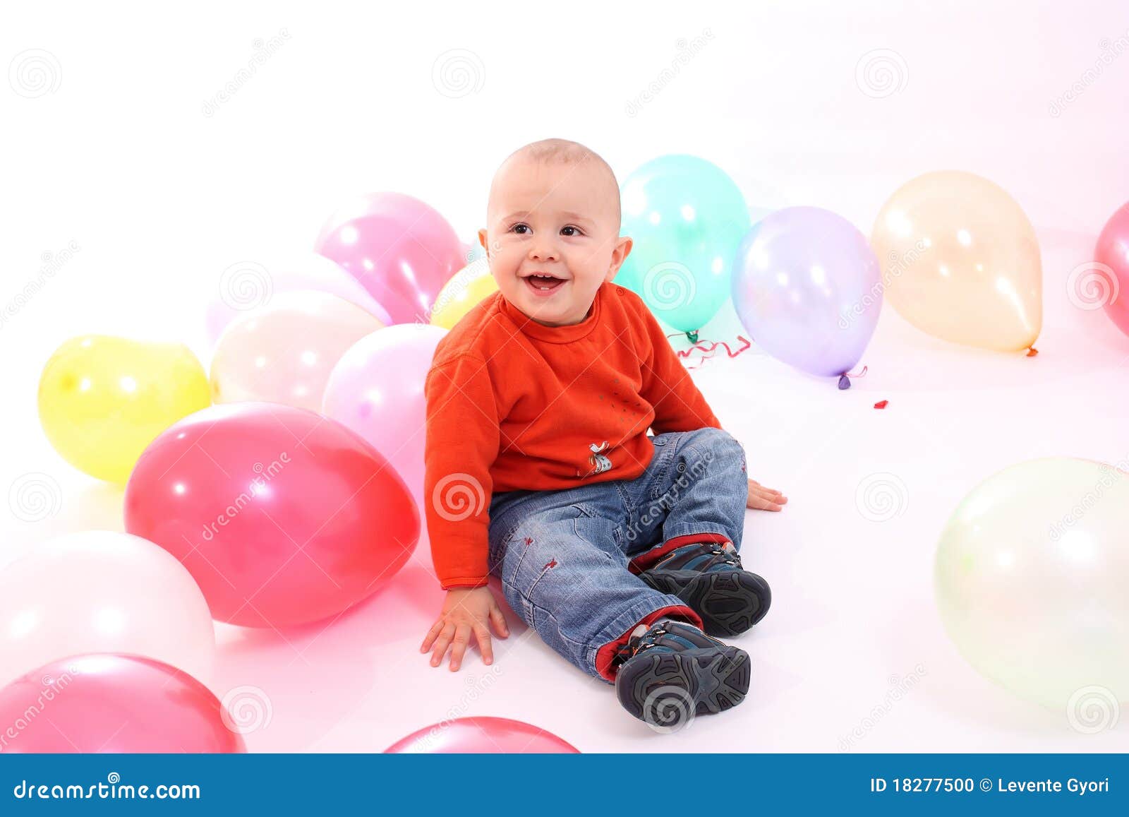 Little Boy With Colored Balloons Stock Photo - Image of face, balloon ...