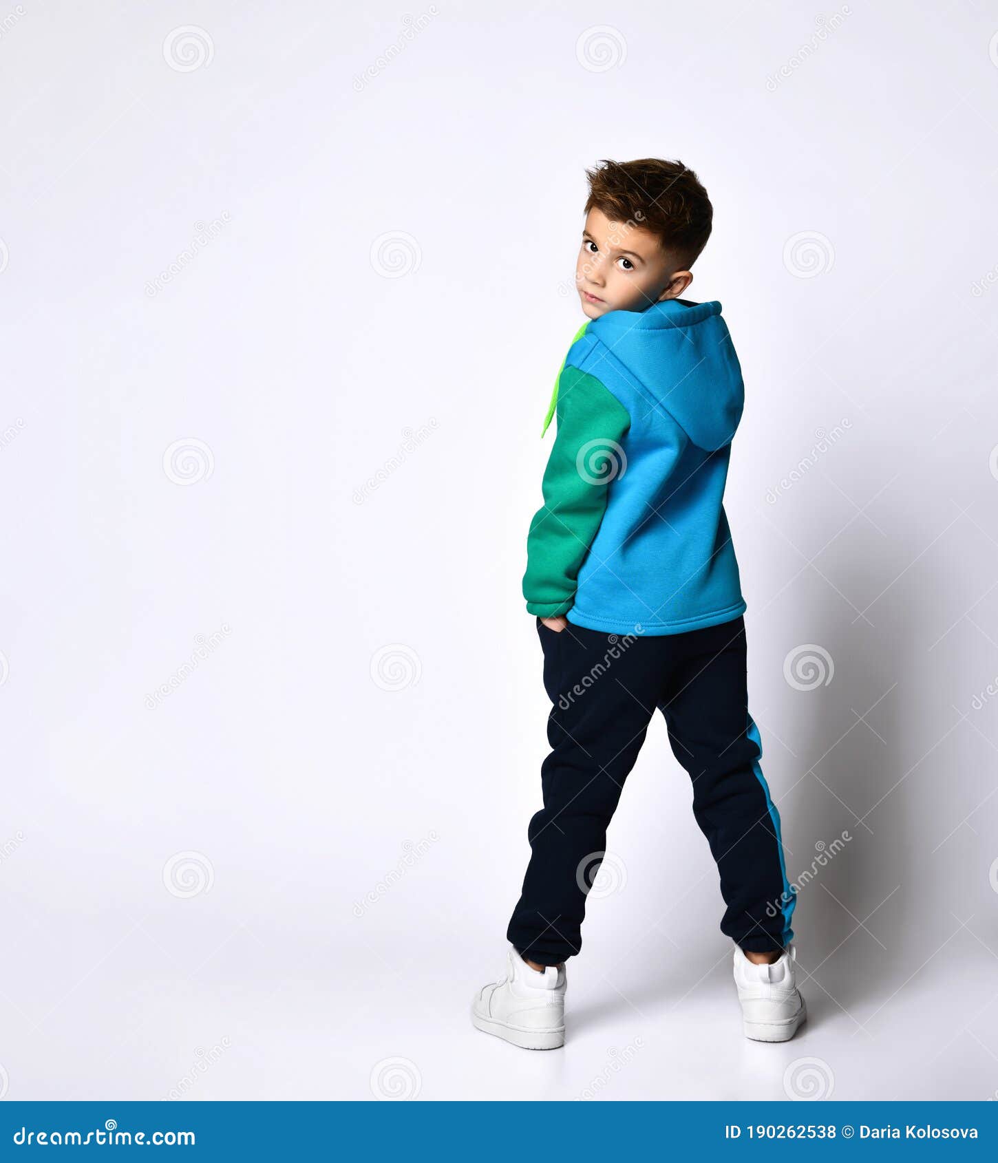 Little Boy in Colorful Sport Suit, Sneakers. he Looking Back, Posing ...