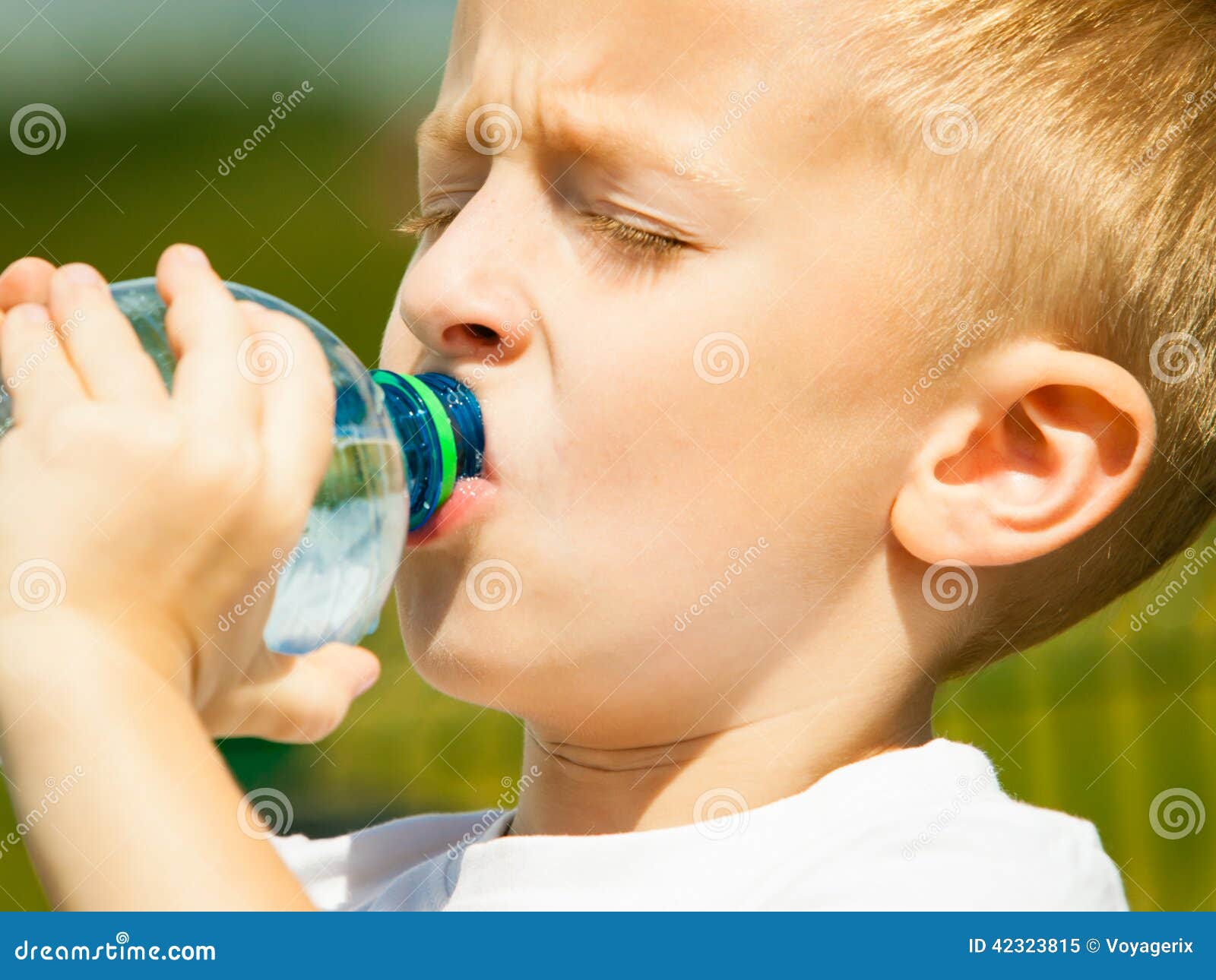 Boy Drinks Water from a Bottle Outdoors Stock Photo - Image of bottle,  happy: 62932108