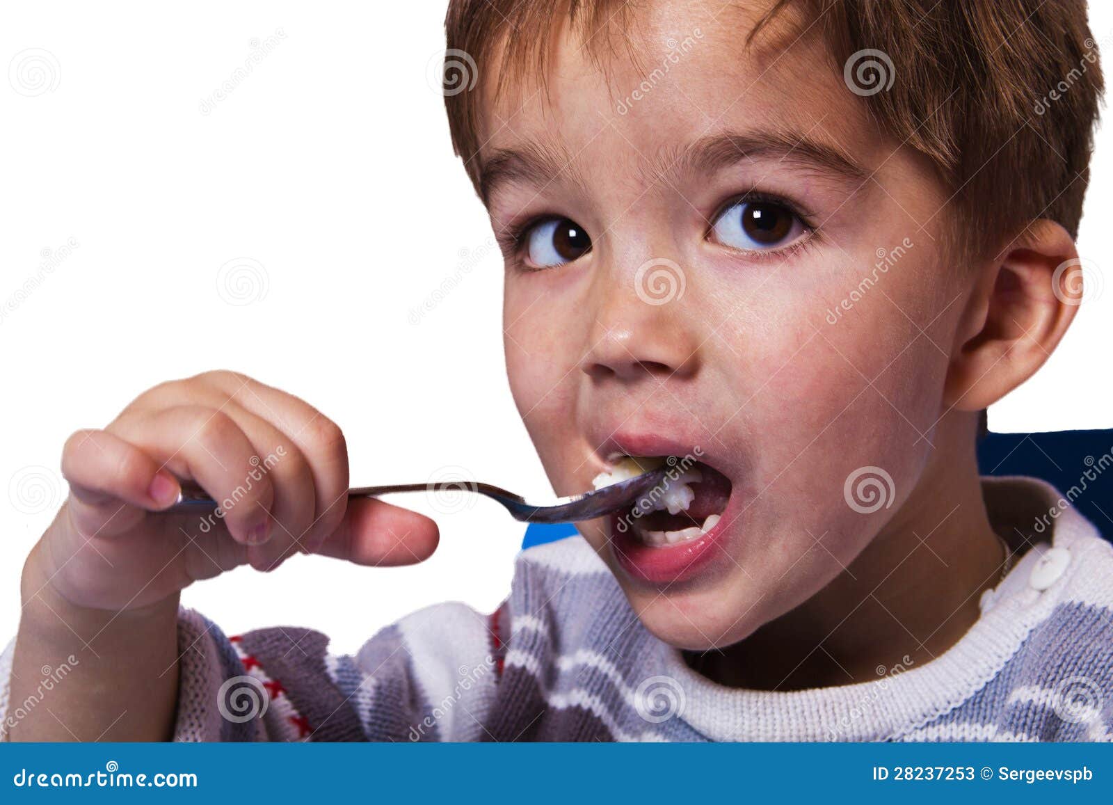 Little boy eats porridge stock image. Image of caucasian 28237253