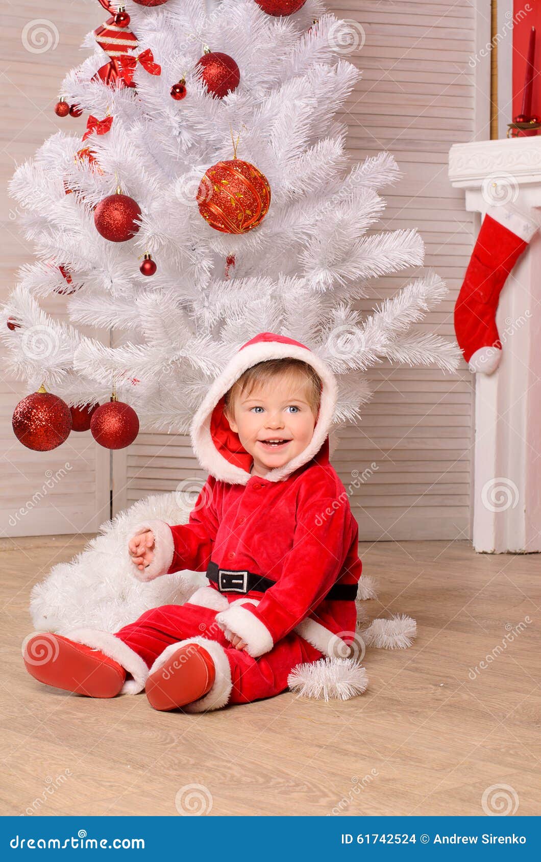 Little Boy in Festive Attire at Christmas Tree Stock Photo - Image of ...