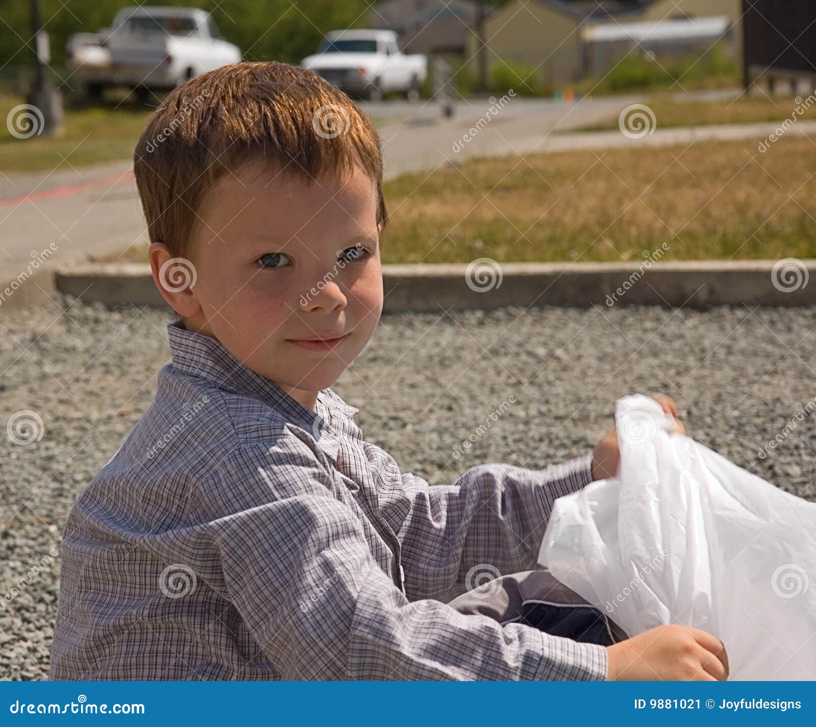 Little Boy with Garbage Bag Outside Stock Image Image of contributing