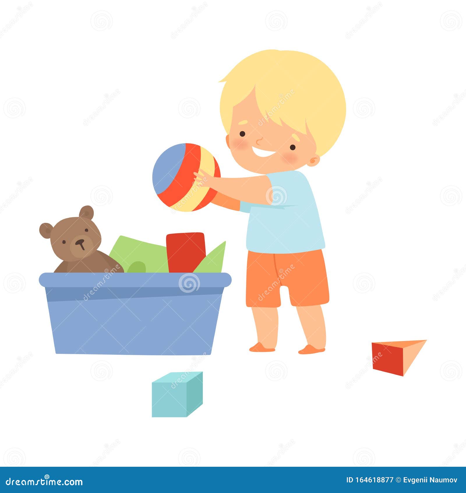 little boy gathering his toys and tidy up his room  